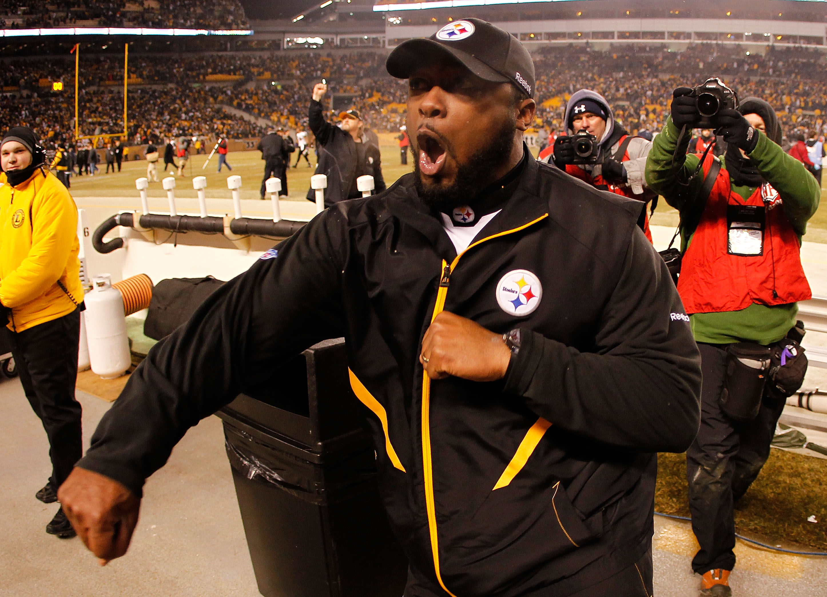 PITTSBURGH, PA - JANUARY 15:  Head coach Mike Tomlin of the Pittsburgh Steelers celebrates after defeating the Baltimore Ravens 31-24 in the AFC Divisional Playoff Game at Heinz Field on January 15, 2011 in Pittsburgh, Pennsylvania.  (Photo by Gregory Sha