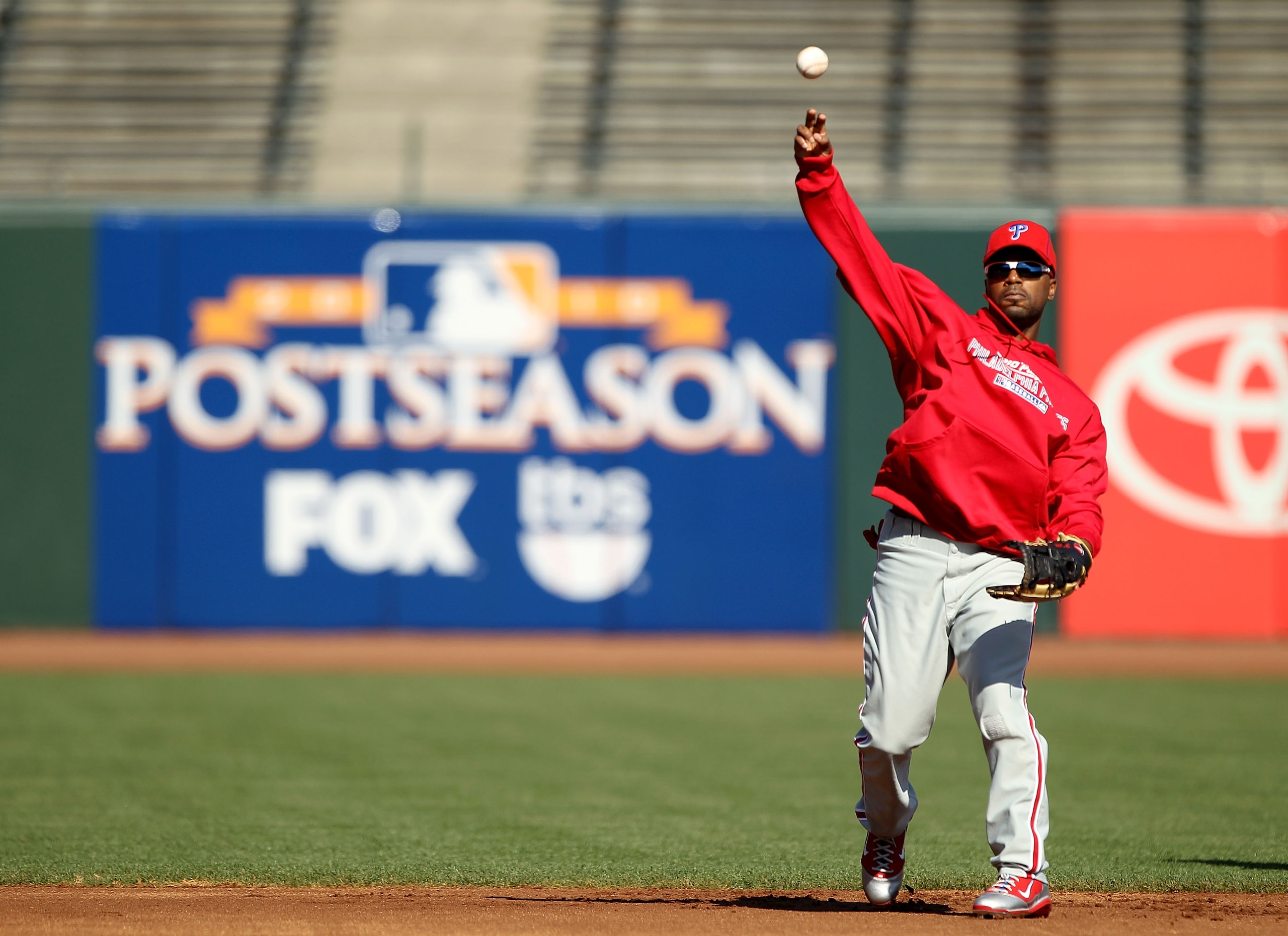 SAN FRANCISCO - OCTOBER 18:  Jimmy Rolllins #11 of the Philadephia Philles takes fielding practice during a workout session for the NLCS at AT&T Park on October 18, 2010 in San Francisco, California.  (Photo by Ezra Shaw/Getty Images)