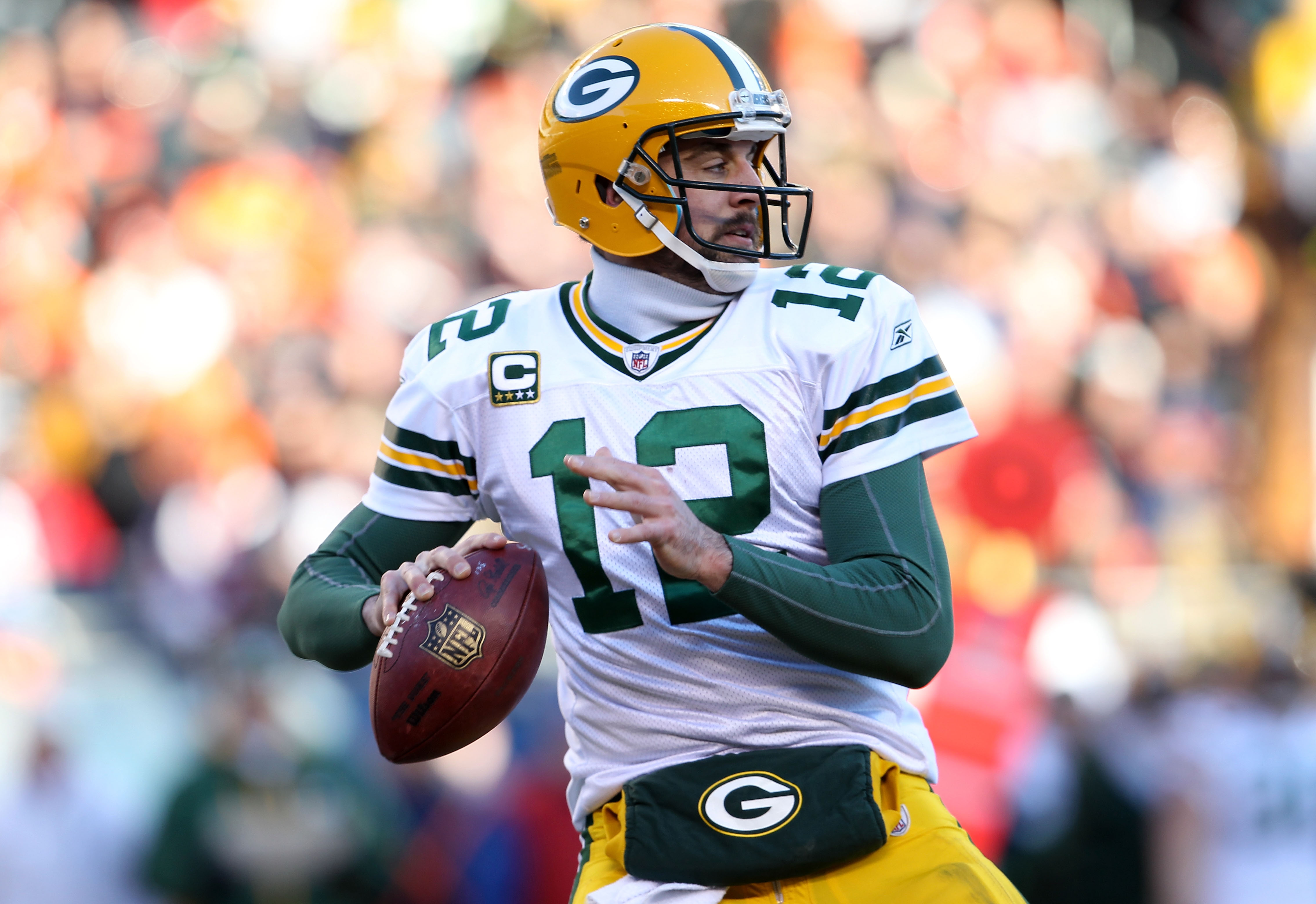CHICAGO, IL - JANUARY 23:  Quarterback Aaron Rodgers #12 of the Green Bay Packers throws a pass in the second half against the Chicago Bears in the NFC Championship Game at Soldier Field on January 23, 2011 in Chicago, Illinois.  (Photo by Jamie Squire/Ge