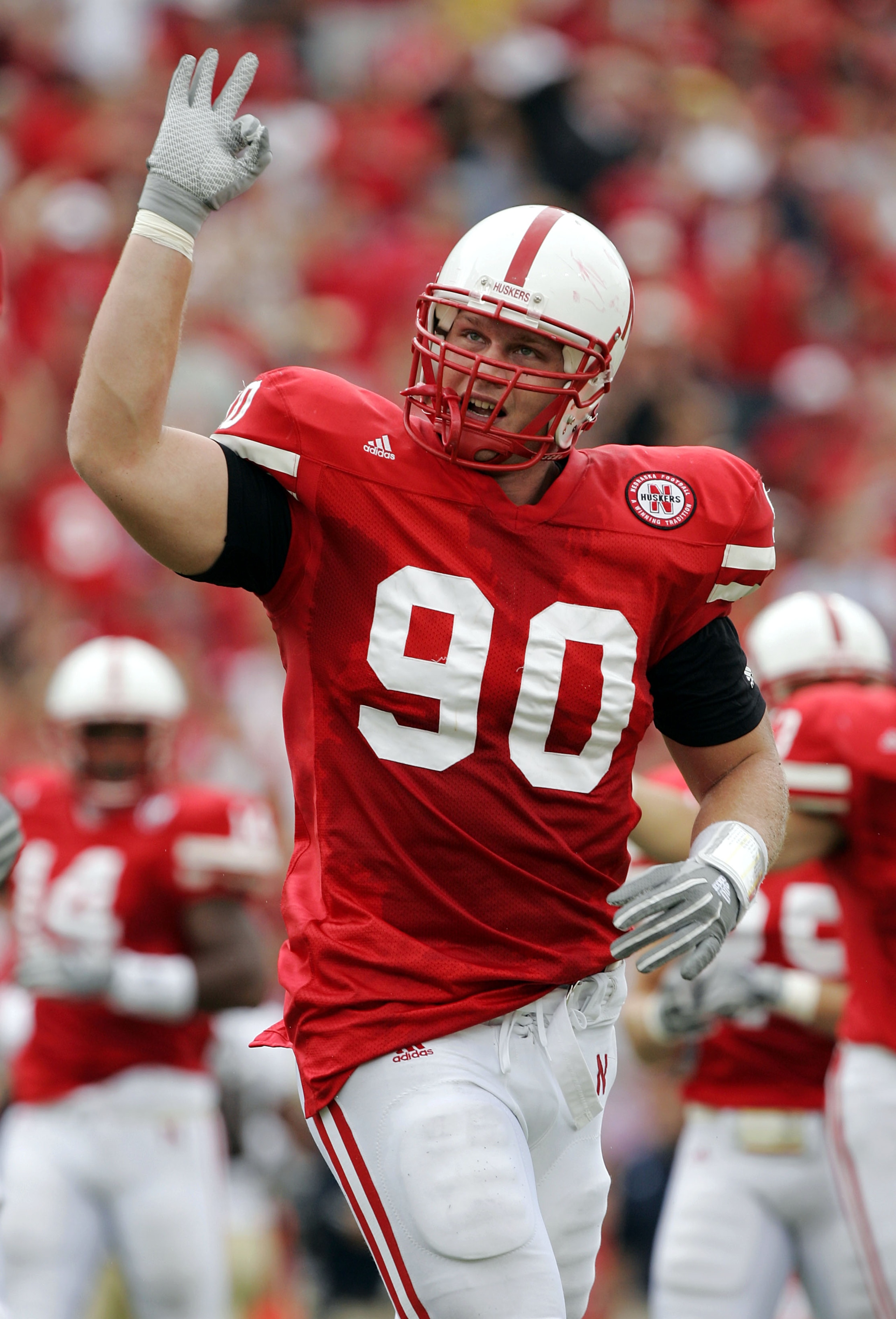 LINCOLN, NE - SEPTEMBER 17:  Defensive end Adam Carriker #90 of the Nebraska Cornhuskers celebrates a sack on Tyler Palko #3 of the Pittsburgh Panthers in the second quarter on September 17, 2005 at Memorial Stadium in Lincoln, Nebraska. Nebraska won 7-6.