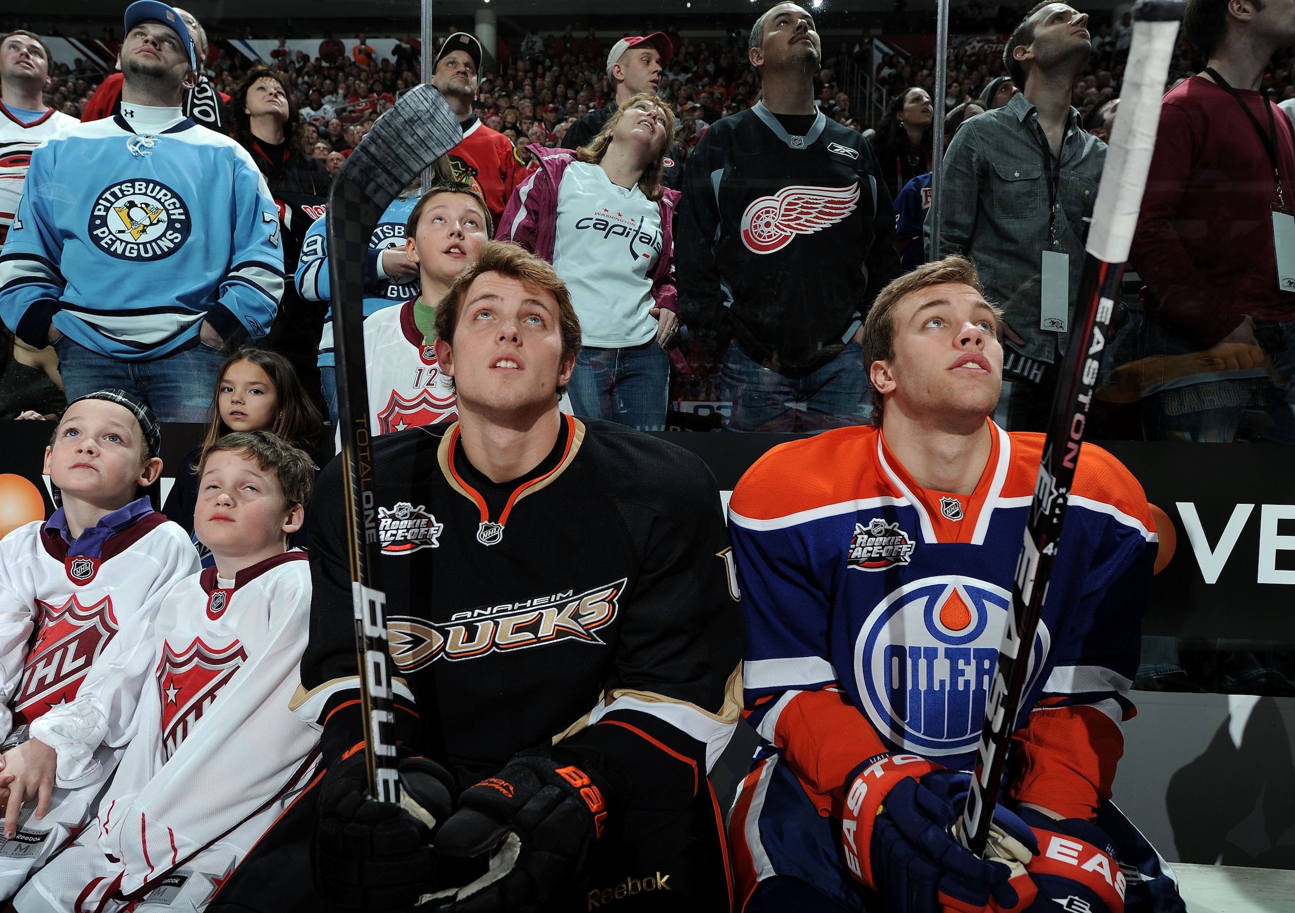 RALEIGH, NC - JANUARY 29:  Cam Fowler #4 of the Anaheim Ducks and Taylor Hall #4 of the Edmonton Oilers look on during the Honda NHL SuperSkills competition part of 2011 NHL All-Star Weekend at the RBC Center on January 29, 2011 in Raleigh, North Carolina