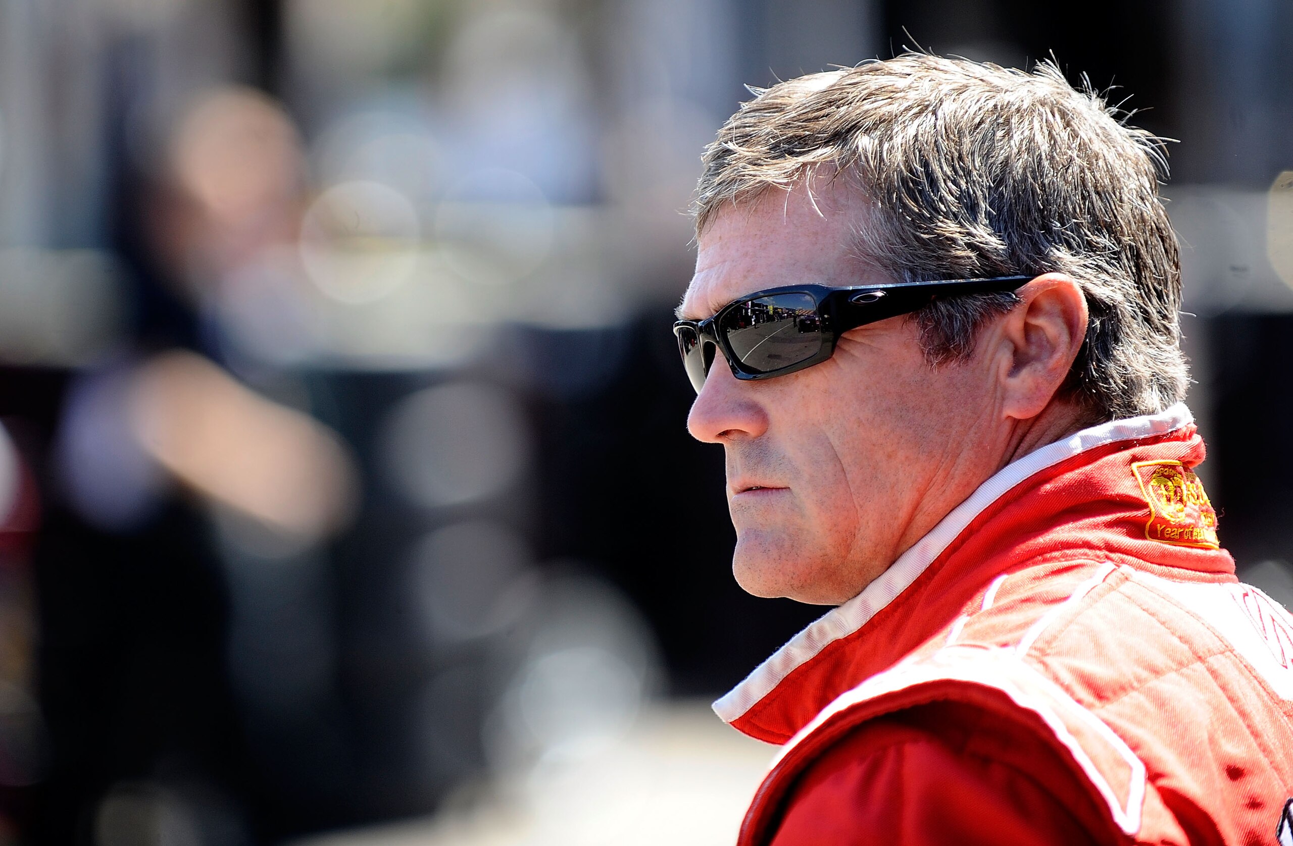 WATKINS GLEN, NY - AUGUST 06:  Bobby Labonte, driver of the #09 Phoenix Construction Chevrolet, walks in the garage area during practice for the NASCAR Heluva Good! Sour Cream Dips at The Glen on August 6, 2010 in Watkins Glen, New York.  (Photo by Jeff Z