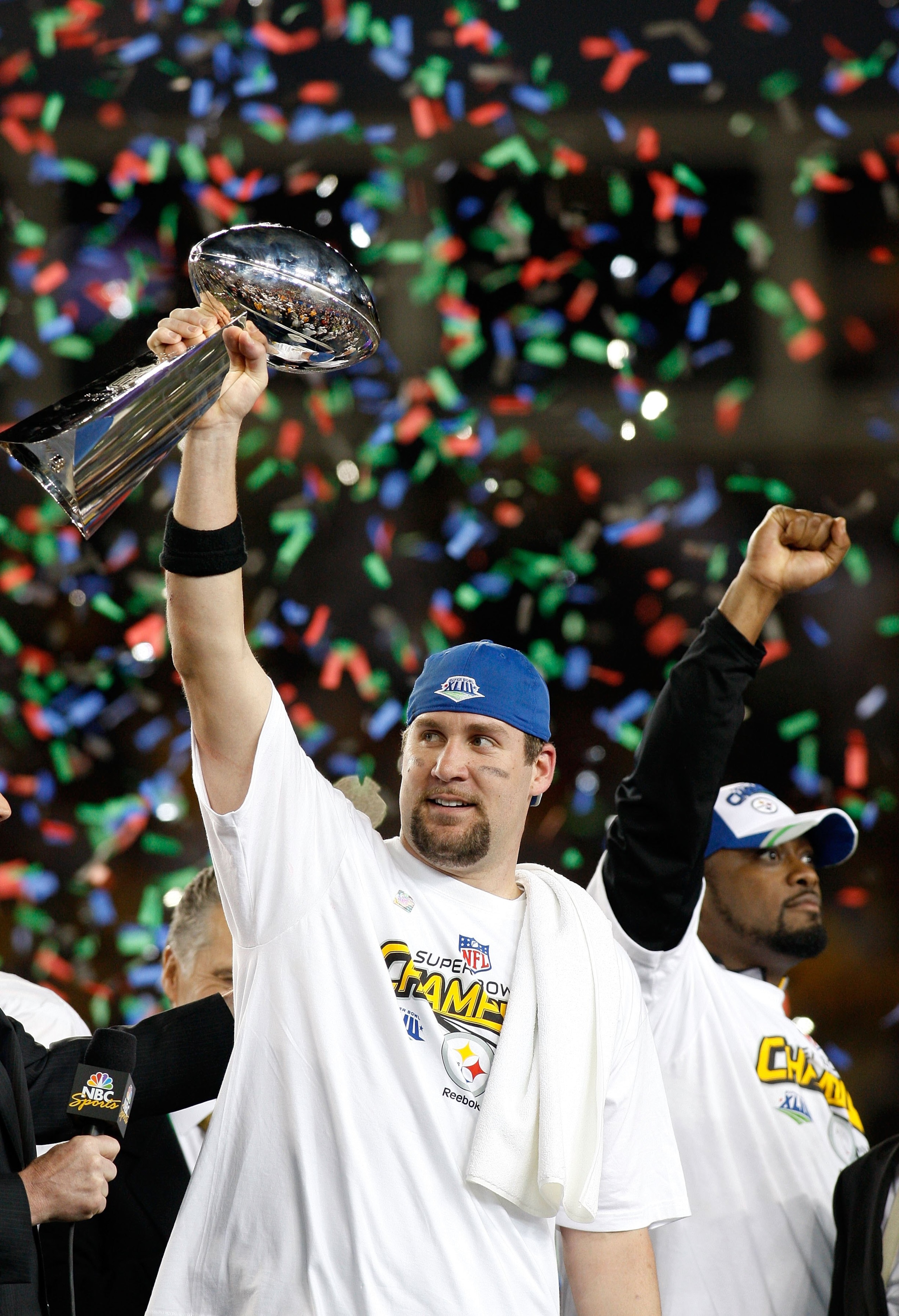 TAMPA, FL - FEBRUARY 01:  Quarterback Ben Roethlisberger #7 and head coach Mike Tomlin (R) of the Pittsburgh Steelers celebrates with the Vince Lombardi trophy after they defeated the Arizona Cardinals 27-23 during Super Bowl XLIII on February 1, 2009 at