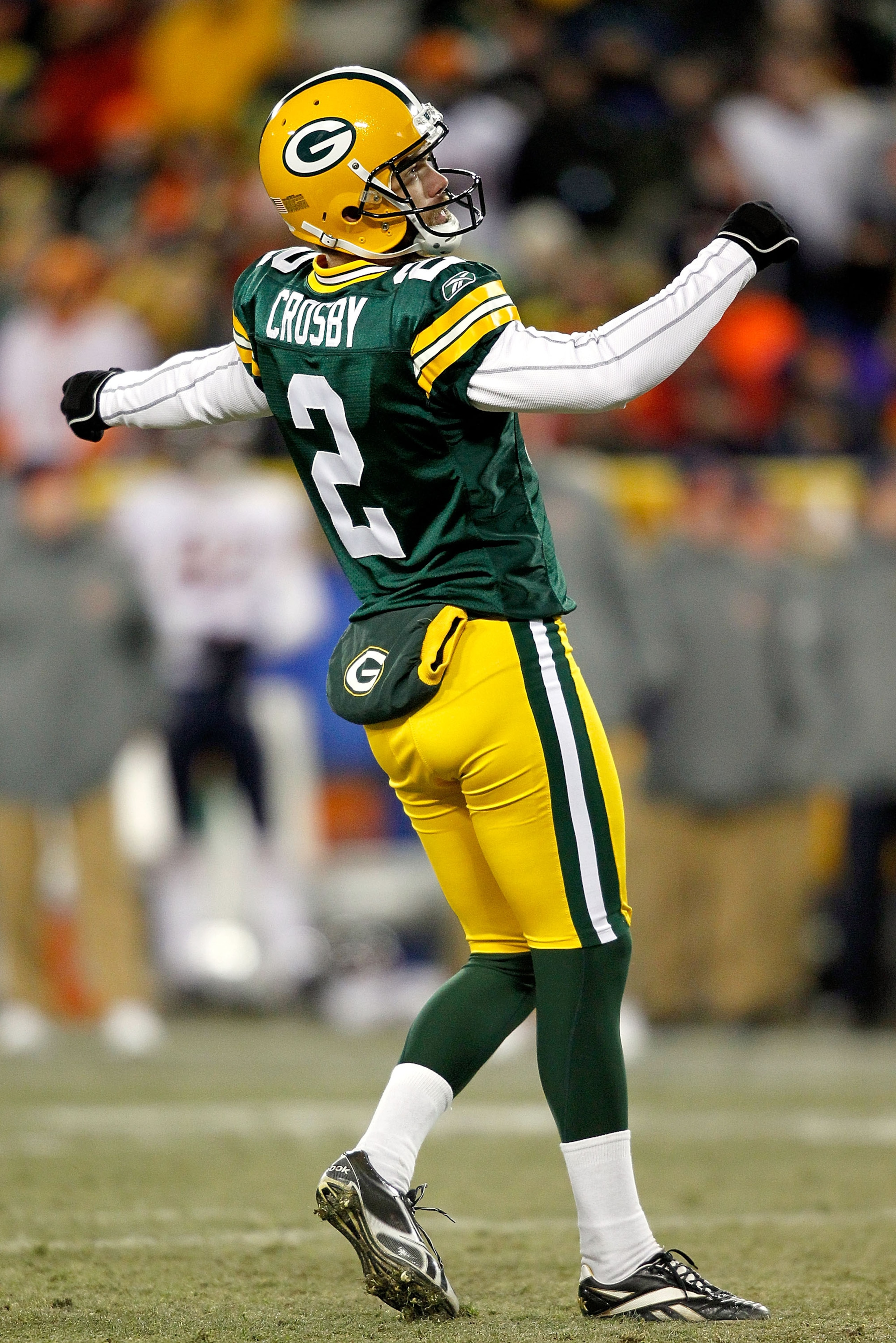 GREEN BAY, WI - JANUARY 02:  Mason Crosby #2 of the Green Bay Packers kicks a field goal against the Chicago Bears at Lambeau Field on January 2, 2011 in Green Bay, Wisconsin.  (Photo by Matthew Stockman/Getty Images)