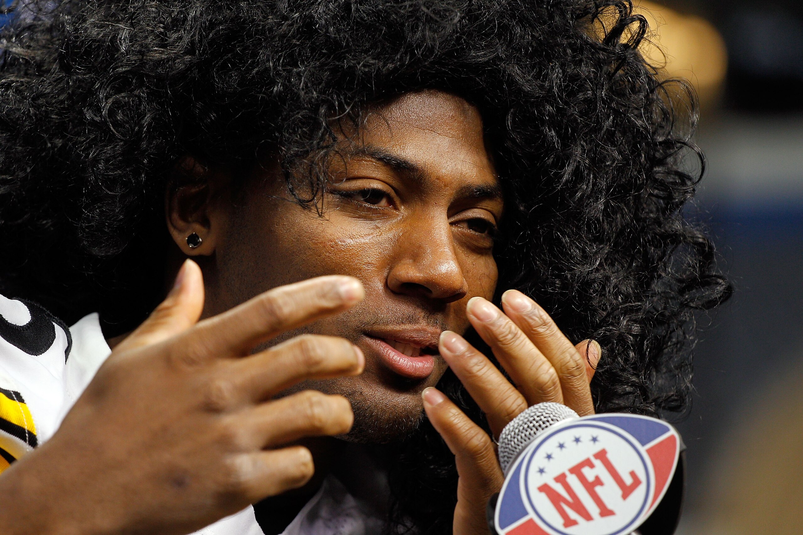 ARLINGTON, TX - FEBRUARY 01:  Ryan Clark #25 of the Pittsburgh Steelers wears a Troy Polamalu #43 wig during Super Bowl XLV Media Day ahead of Super Bowl XLV at Cowboys Stadium on February 1, 2011 in Arlington, Texas. The Pittsburgh Steelers will play the