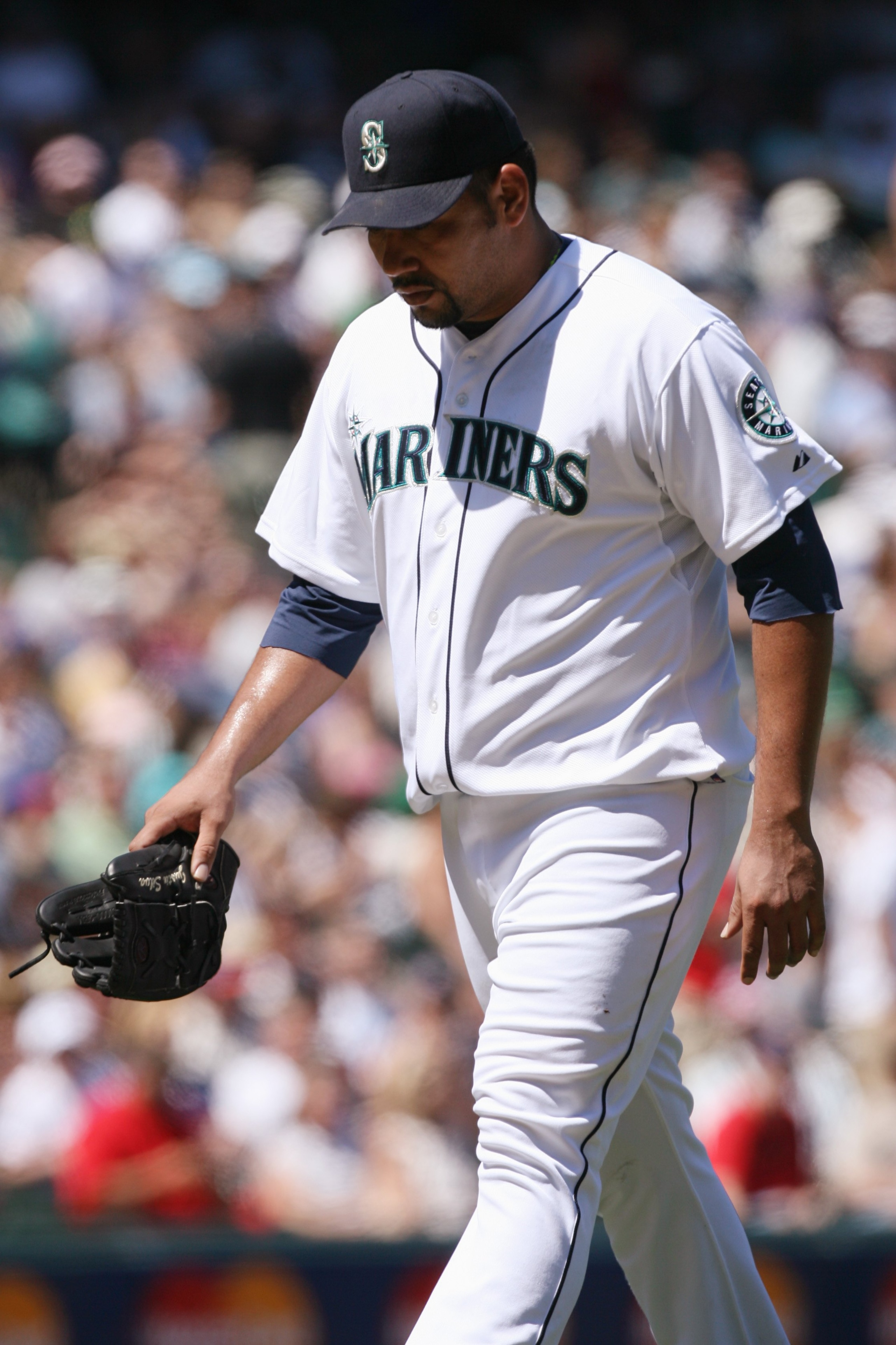 SEATTLE - JULY 20:  Carlos Silva #52 of the Seattle Mariners walks off the mound against the Cleveland Indians on July 20, 2008 at Safeco Field in Seattle, Washington. The Indians defeated the Mariners 6-2. (Photo by Otto Greule Jr/Getty Images)