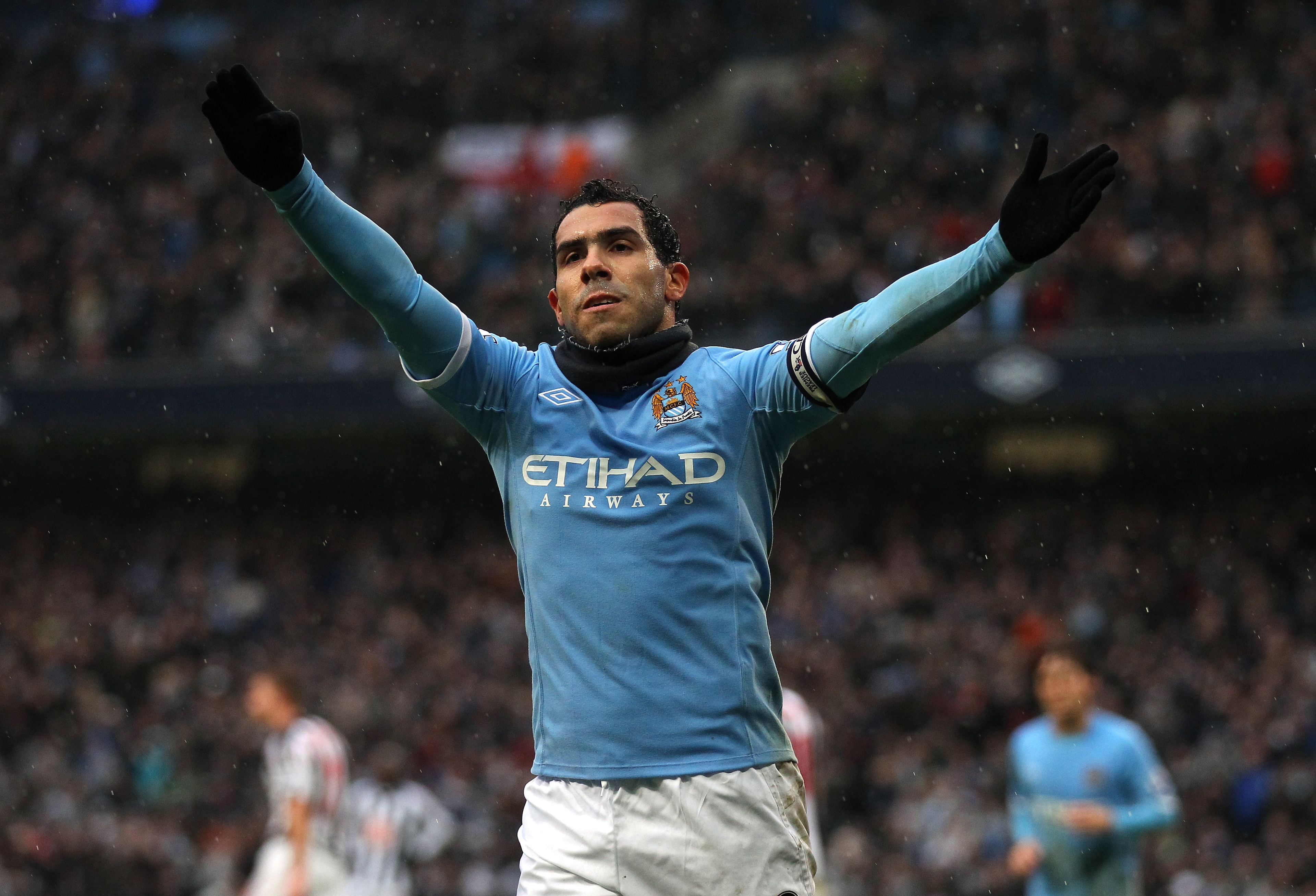 MANCHESTER, ENGLAND - FEBRUARY 05:  Carlos Tevez of Manchester City celebrates after scoring his third goal during the Barclays Premier League match between Manchester City and West Bromwich Albion at the City of Manchester Stadium on February 5, 2011 in