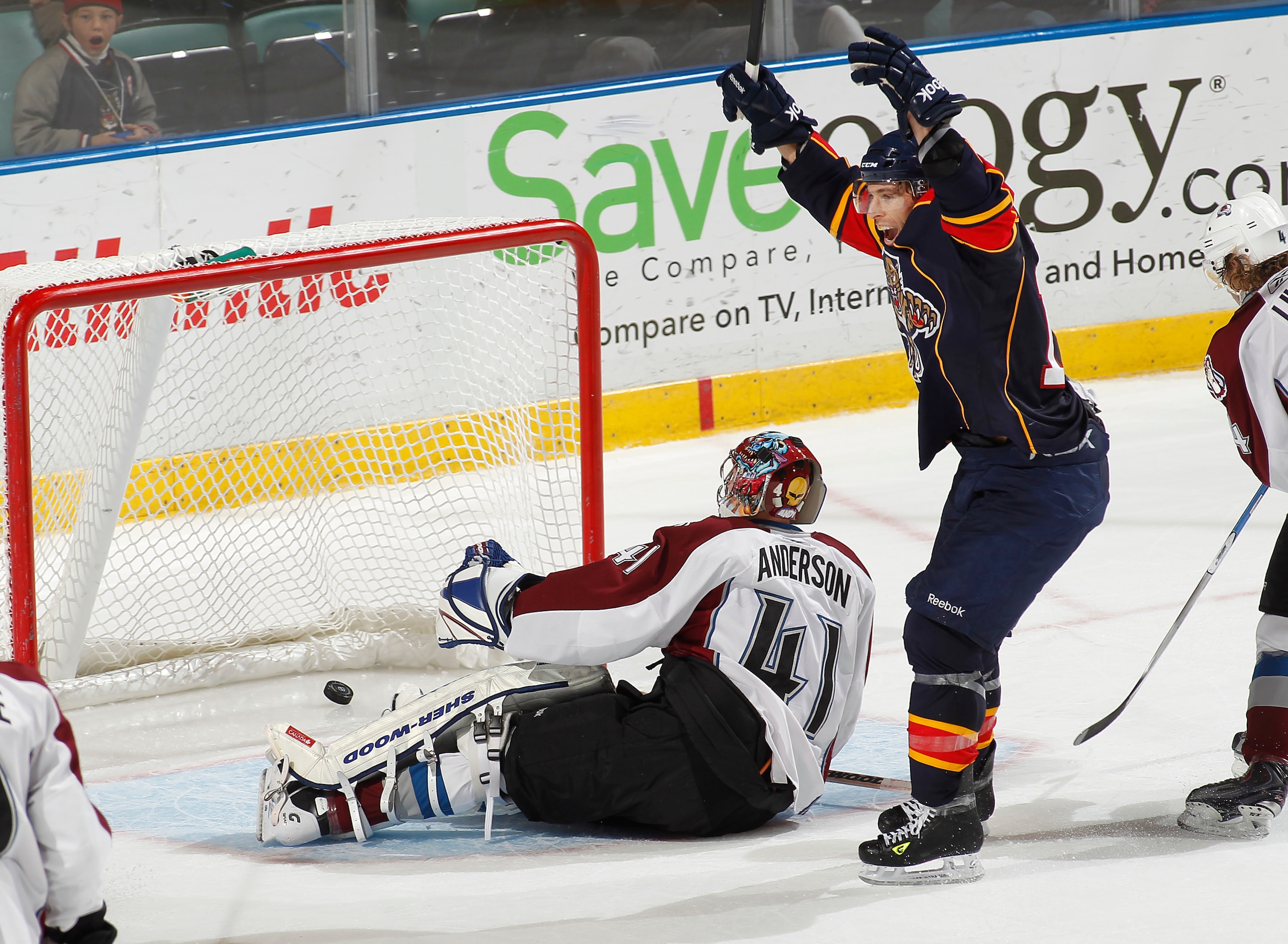 SUNRISE, FL - DECEMBER 7: Goaltender Craig Anderson #41 of the Colorado Avalanche looks back at the net as David Booth #10 celebrates the overtime goal by Stephen Weiss #9 of the Florida Panthers in overtime on December 7, 2010 at the BankAtlantic Center