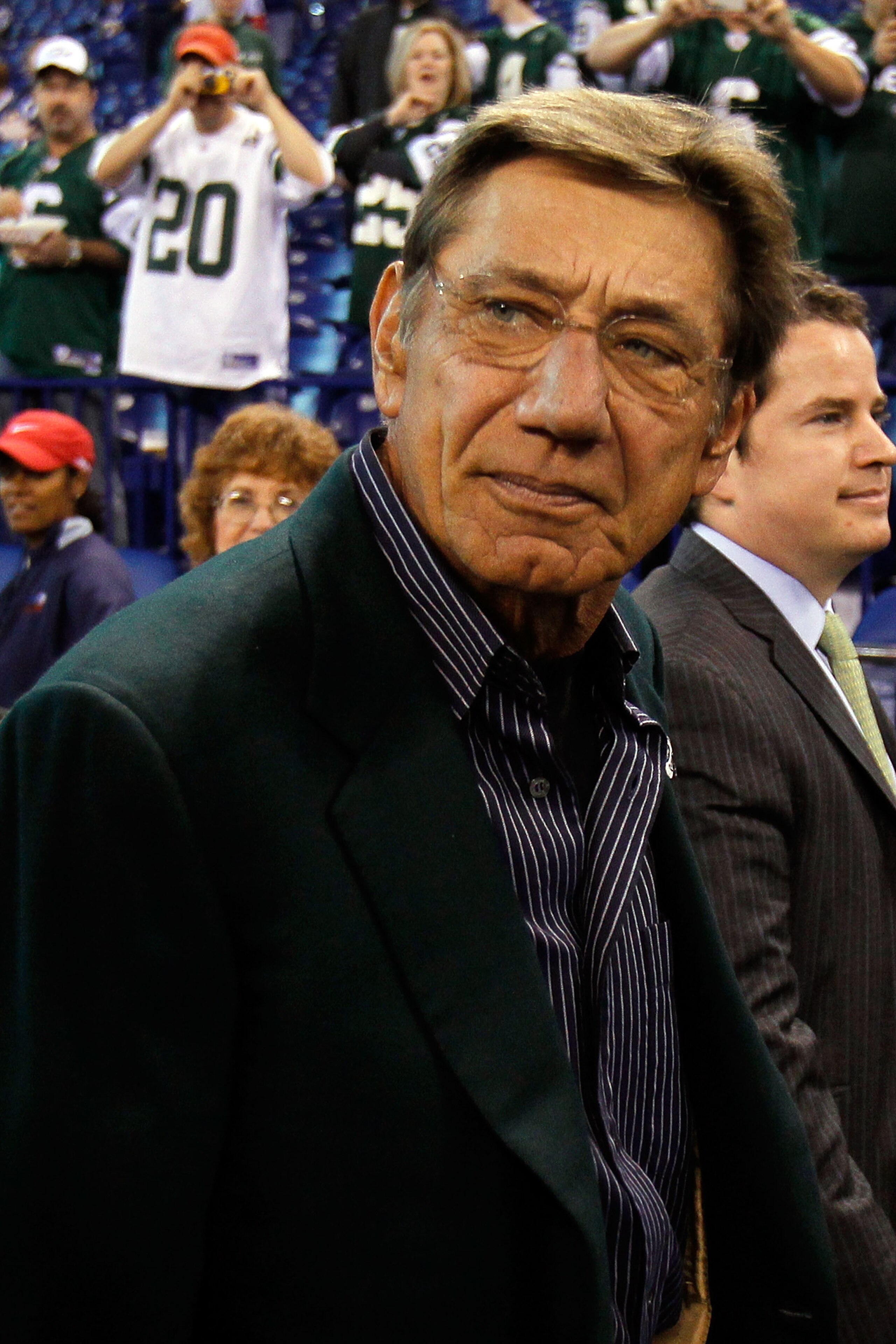 INDIANAPOLIS - JANUARY 24:  Joe Namath, former Jets quarterback, looks on from the sidelines before  the New York Jets take on the Indianapolis Colts during the AFC Championship Game at Lucas Oil Stadium on January 24, 2010 in Indianapolis, Indiana.  (Pho