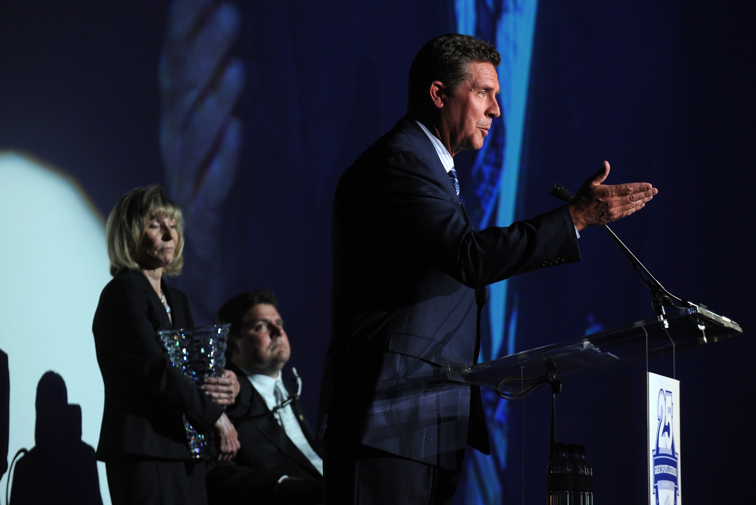 NEW YORK - SEPTEMBER 27:  (R) Former NFL player and 2010 honoree Dan Marino speaks during the 25th Great Sports Legends Dinner to benefit The Buoniconti Fund to Cure Paralysis at The Waldorf=Astoria on September 27, 2010 in New York City.  (Photo by Bryan