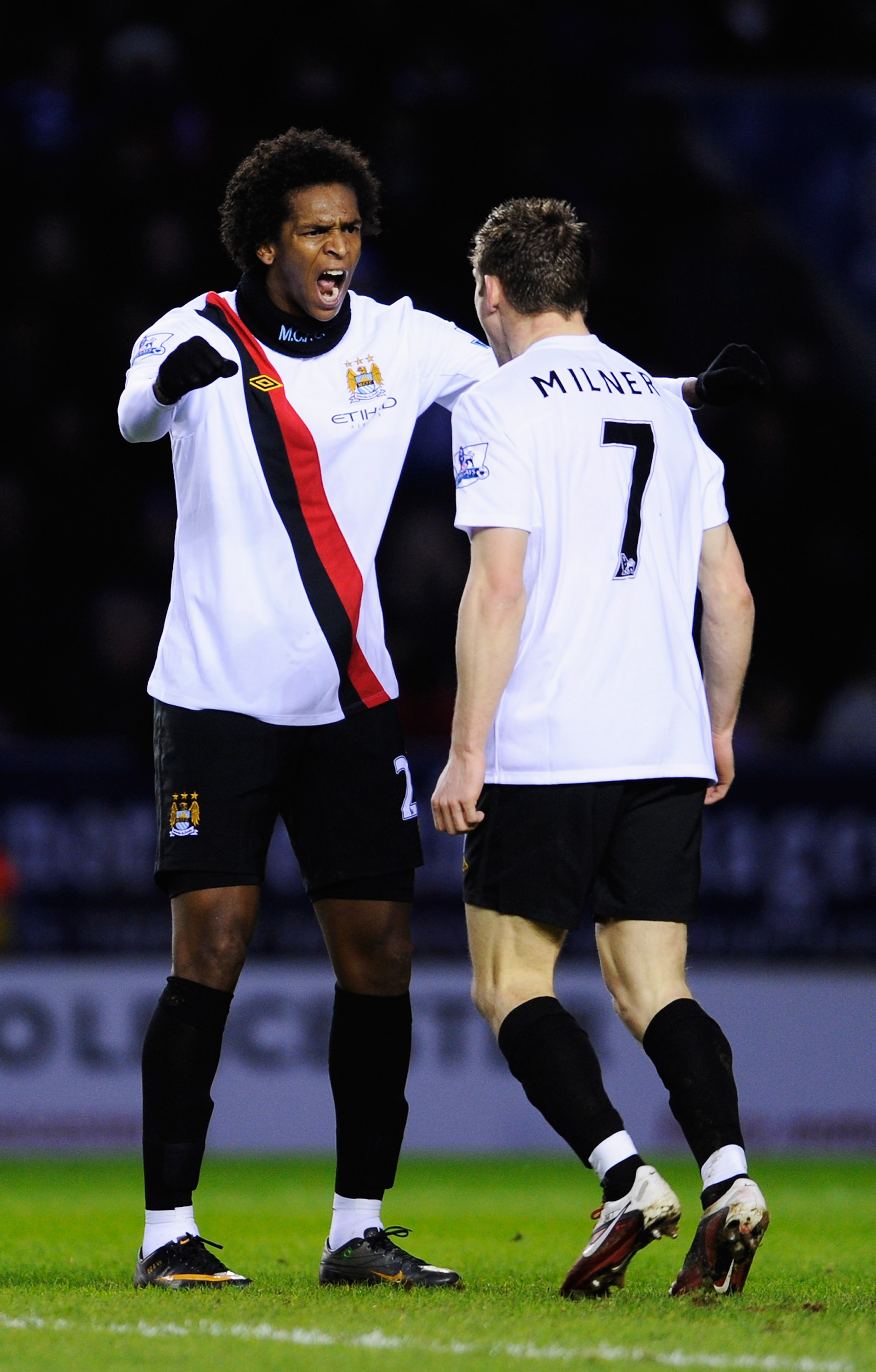 LEICESTER, UNITED KINGDOM - JANUARY 09:  James Milner (R) of Manchester City celebrates with team mate Jo Silva (L) after scoring during the FA Cup sponsored by E.ON 3rd Round match between between Leicester City and Manchester City at Walkers Stadium on 
