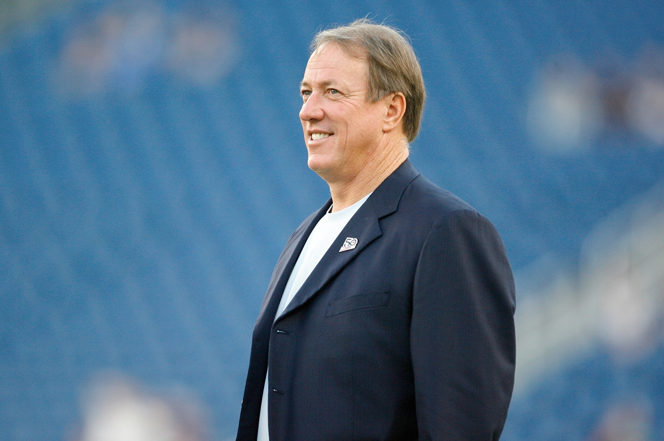 FOXBORO, MA - SEPTEMBER 14:  Hall of fame quarterback for the Buffalo Bills, Jim Kelly stands on the field before the game between the New England Patriots and the Buffalo Bills on September 14, 2009 at Gillette Stadium in Foxboro, Massachusetts. (Photo b