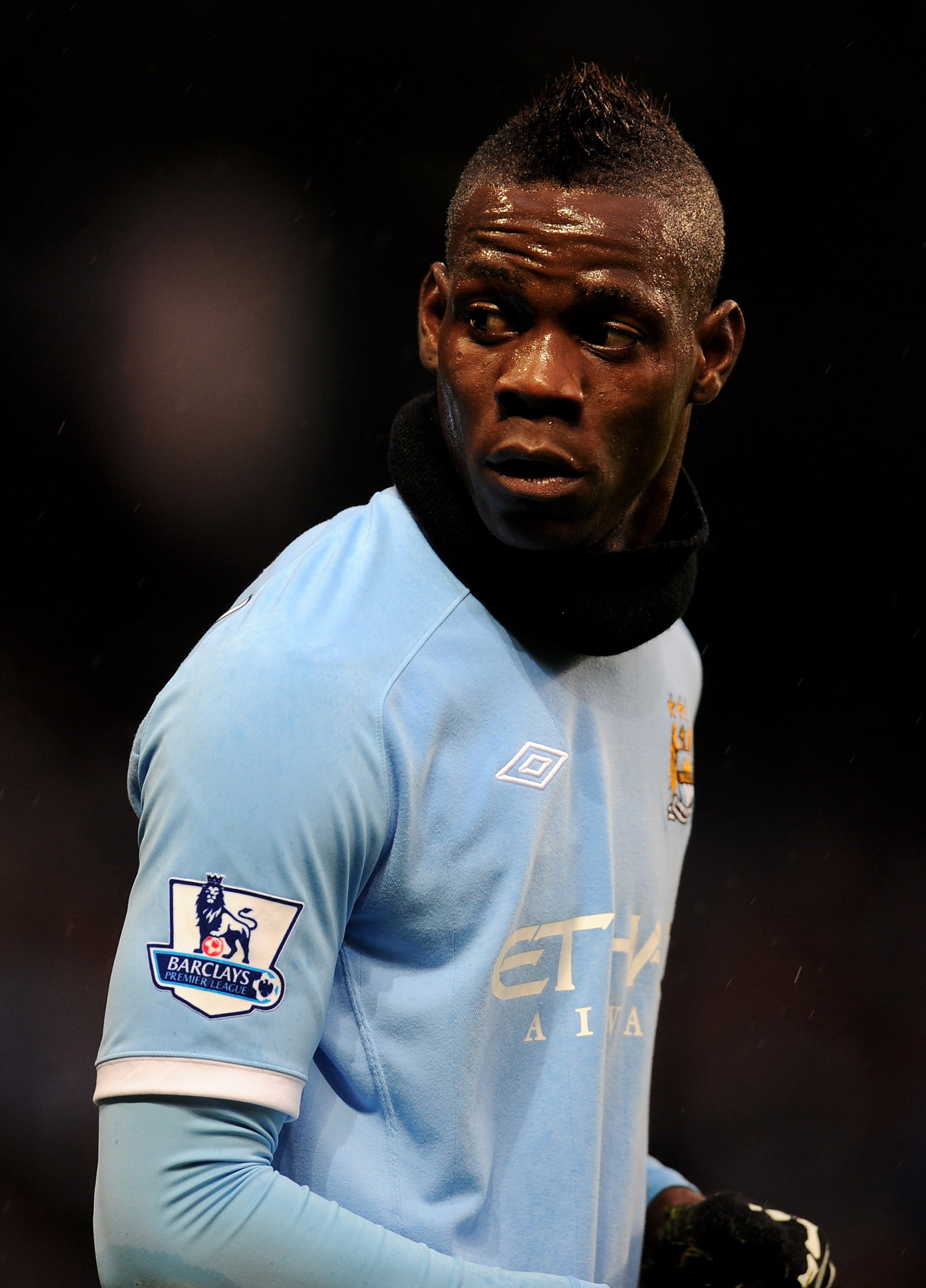 MANCHESTER, ENGLAND - DECEMBER 04: Mario Balotelli of Manchester City looks on during the Barclays Premier League match between Manchester City and Bolton Wanderers at the City of Manchester Stadium on December 4, 2010 in Manchester, England. (Photo by MANCHESTER, ENGLAND - DECEMBER 04: Mario Balotelli of Manchester City looks on during the Barclays Premier League match between Manchester City and Bolton Wanderers at the City of Manchester Stadium on December 4, 2010 in Manchester, England. (Photo by