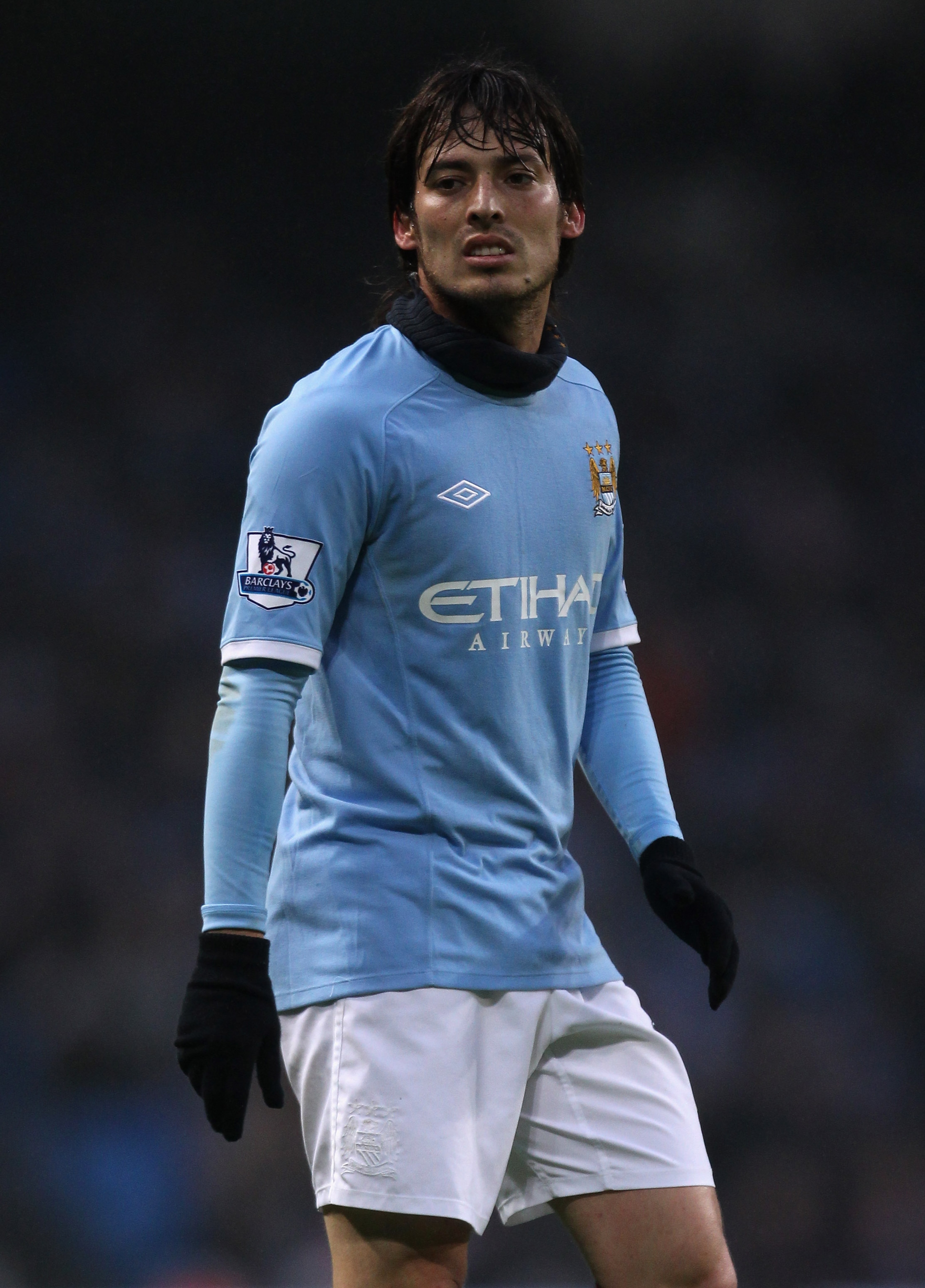 MANCHESTER, ENGLAND - DECEMBER 28:  David Silva of Manchester City looks on during the Barclays Premier League match between Manchester City and Aston Villa at the City of Manchester Stadium on December 28, 2010 in Manchester, England.  (Photo by Alex Liv