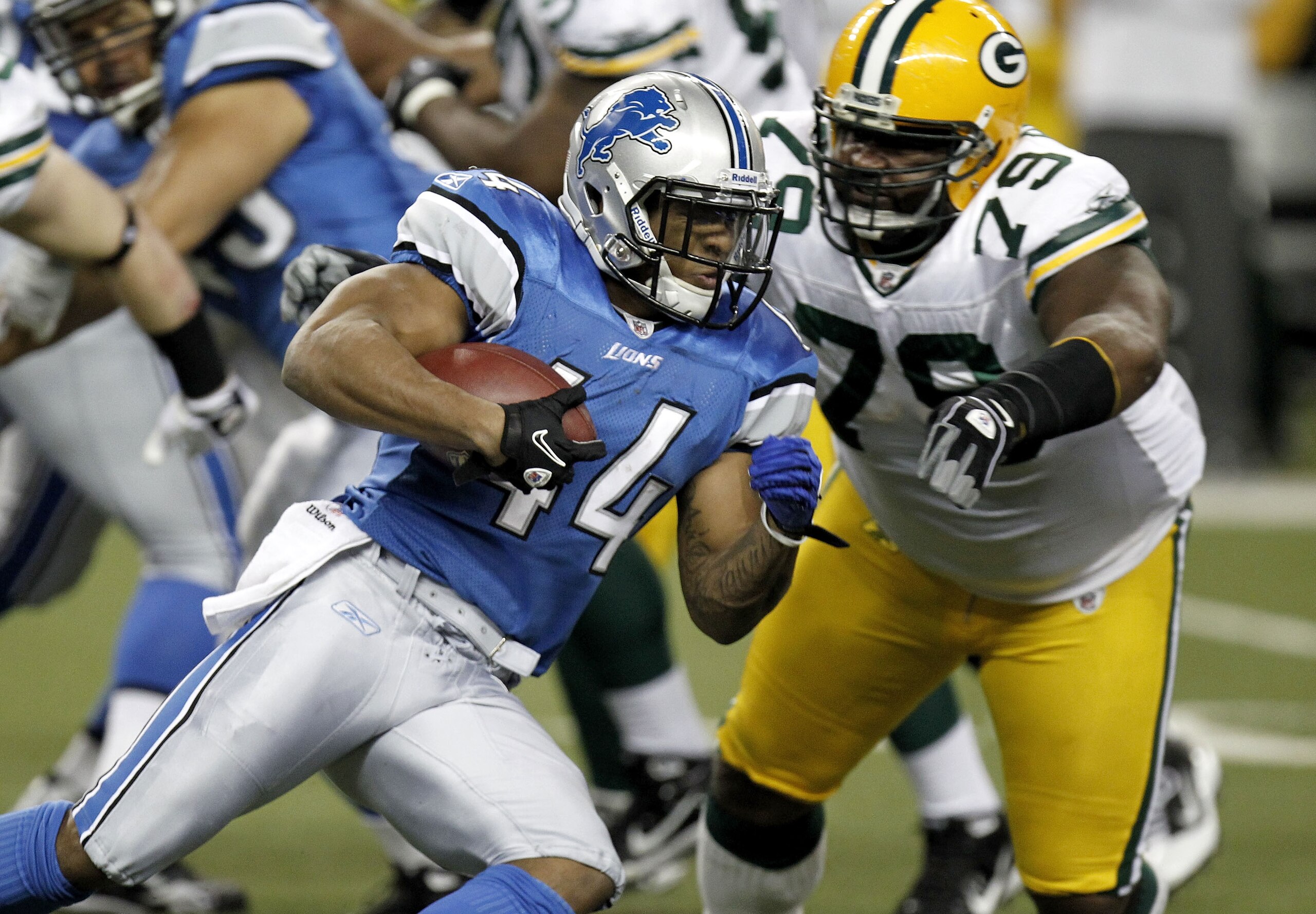 DETROIT, MI - DECEMBER 12: Jahvid Best #44 of the Detroit Lions tries to get around the tackle of Ryan Pickett #79 of the Green Bay Packers on December 12, 2010 at Ford Field in Detroit, Michigan. (Photo by Gregory Shamus/Getty Images) DETROIT, MI - DECEMBER 12: Jahvid Best #44 of the Detroit Lions tries to get around the tackle of Ryan Pickett #79 of the Green Bay Packers on December 12, 2010 at Ford Field in Detroit, Michigan. (Photo by Gregory Shamus/Getty Images)