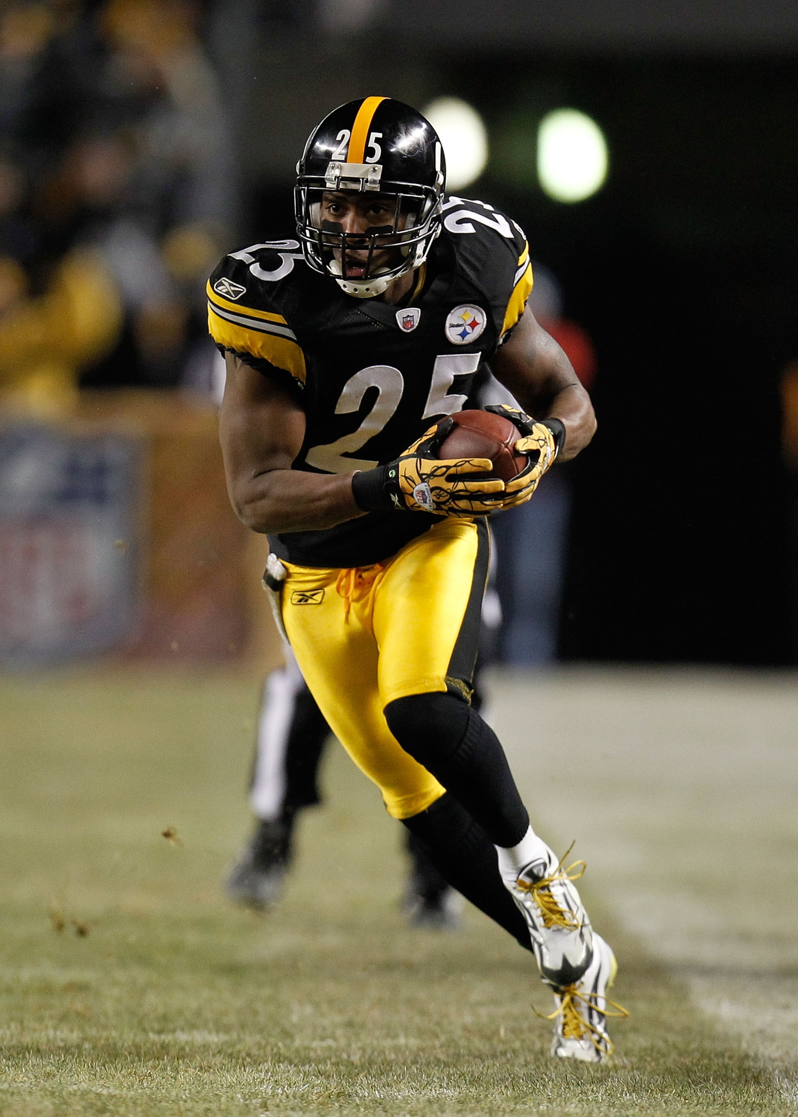 PITTSBURGH, PA - JANUARY 15: Safety Ryan Clark #25 of the Pittsburgh Steelers runs back the ball after an interception of quarterback Joe Flacco #5 of the Baltimore Ravens in the third quarter of the AFC Divisional Playoff Game at Heinz Field on January PITTSBURGH, PA - JANUARY 15: Safety Ryan Clark #25 of the Pittsburgh Steelers runs back the ball after an interception of quarterback Joe Flacco #5 of the Baltimore Ravens in the third quarter of the AFC Divisional Playoff Game at Heinz Field on January