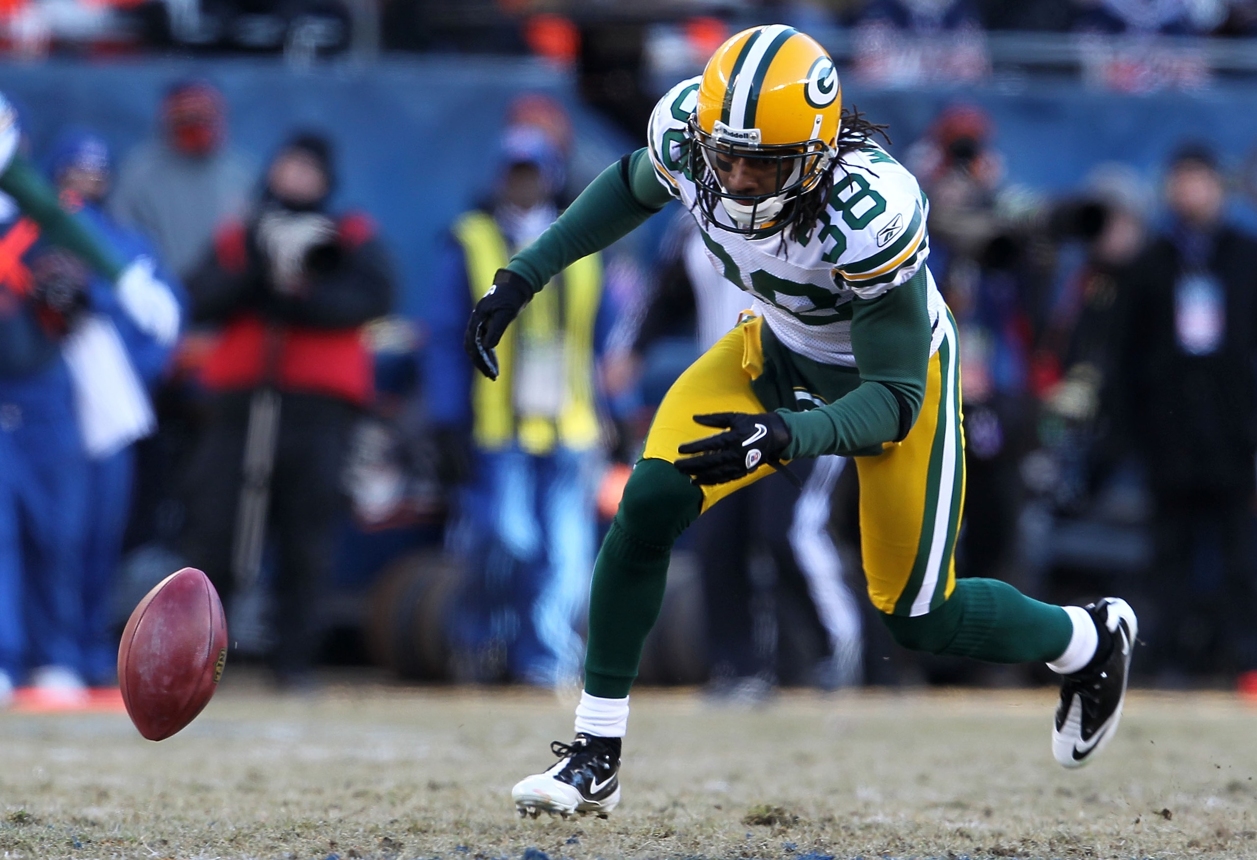 CHICAGO, IL - JANUARY 23: Tramon Williams #38 of the Green Bay Packers drops a punt against the Chicago Bears in the NFC Championship Game at Soldier Field on January 23, 2011 in Chicago, Illinois. (Photo by Jamie Squire/Getty Images) CHICAGO, IL - JANUARY 23: Tramon Williams #38 of the Green Bay Packers drops a punt against the Chicago Bears in the NFC Championship Game at Soldier Field on January 23, 2011 in Chicago, Illinois. (Photo by Jamie Squire/Getty Images)