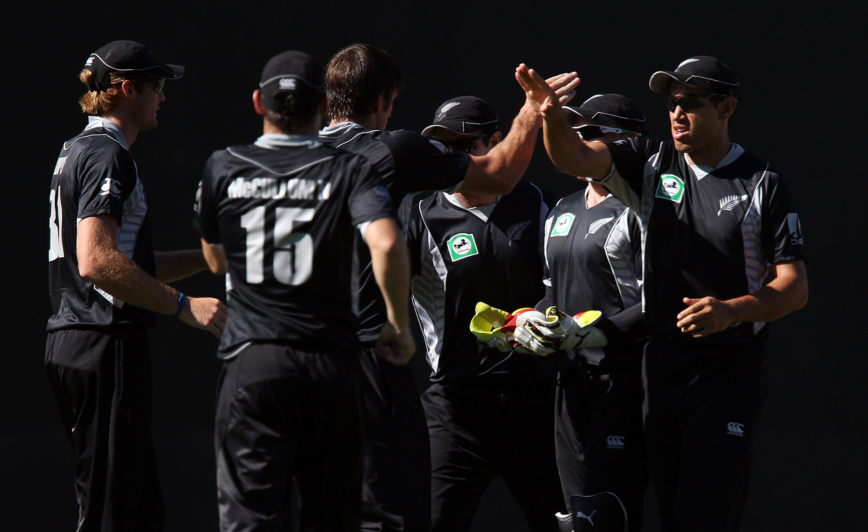 AUCKLAND, NEW ZEALAND - FEBRUARY 05:  Ross Taylor (R) of the Black Caps celebrates with Hamish Bennett after taking the wicket of Younis Khan of Pakistan during game six of the one day series between New Zealand and Pakistan at Eden Park on February 5, 20
