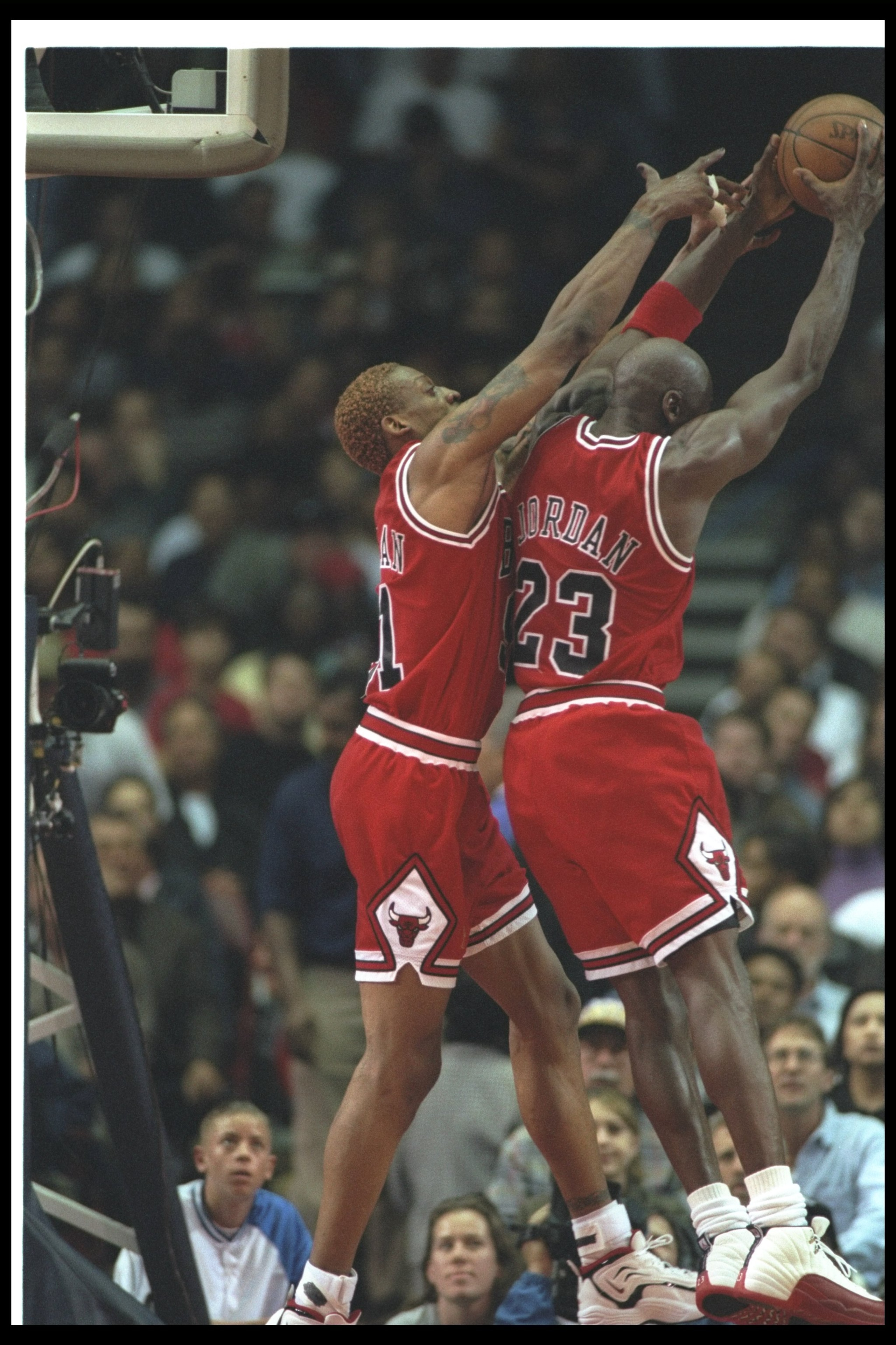 25 Nov 1996:  Chicago Bulls guard Michael Jordan (right) and forward Dennis Rodman go up for a rebound during a game against the Los Angeles Clippers at the Sports Arena in Los Angeles, California.  The Bulls won the game, 88-84.     Mandatory Credit: J.