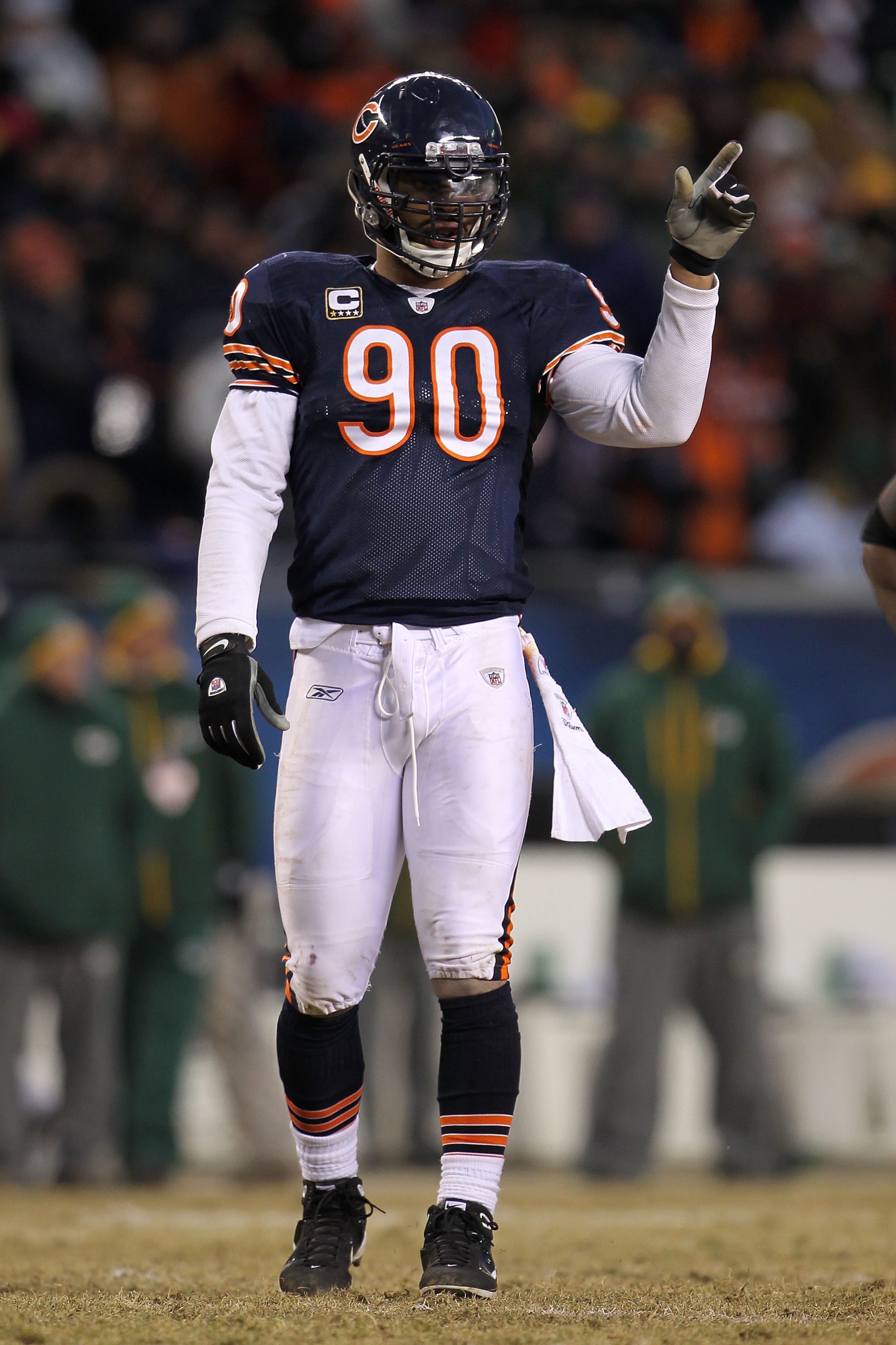 CHICAGO, IL - JANUARY 23: Julius Peppers #90 of the Chicago Bears reacts while taking on the Green Bay Packers in the NFC Championship Game at Soldier Field on January 23, 2011 in Chicago, Illinois. (Photo by Jamie Squire/Getty Images) CHICAGO, IL - JANUARY 23: Julius Peppers #90 of the Chicago Bears reacts while taking on the Green Bay Packers in the NFC Championship Game at Soldier Field on January 23, 2011 in Chicago, Illinois. (Photo by Jamie Squire/Getty Images)