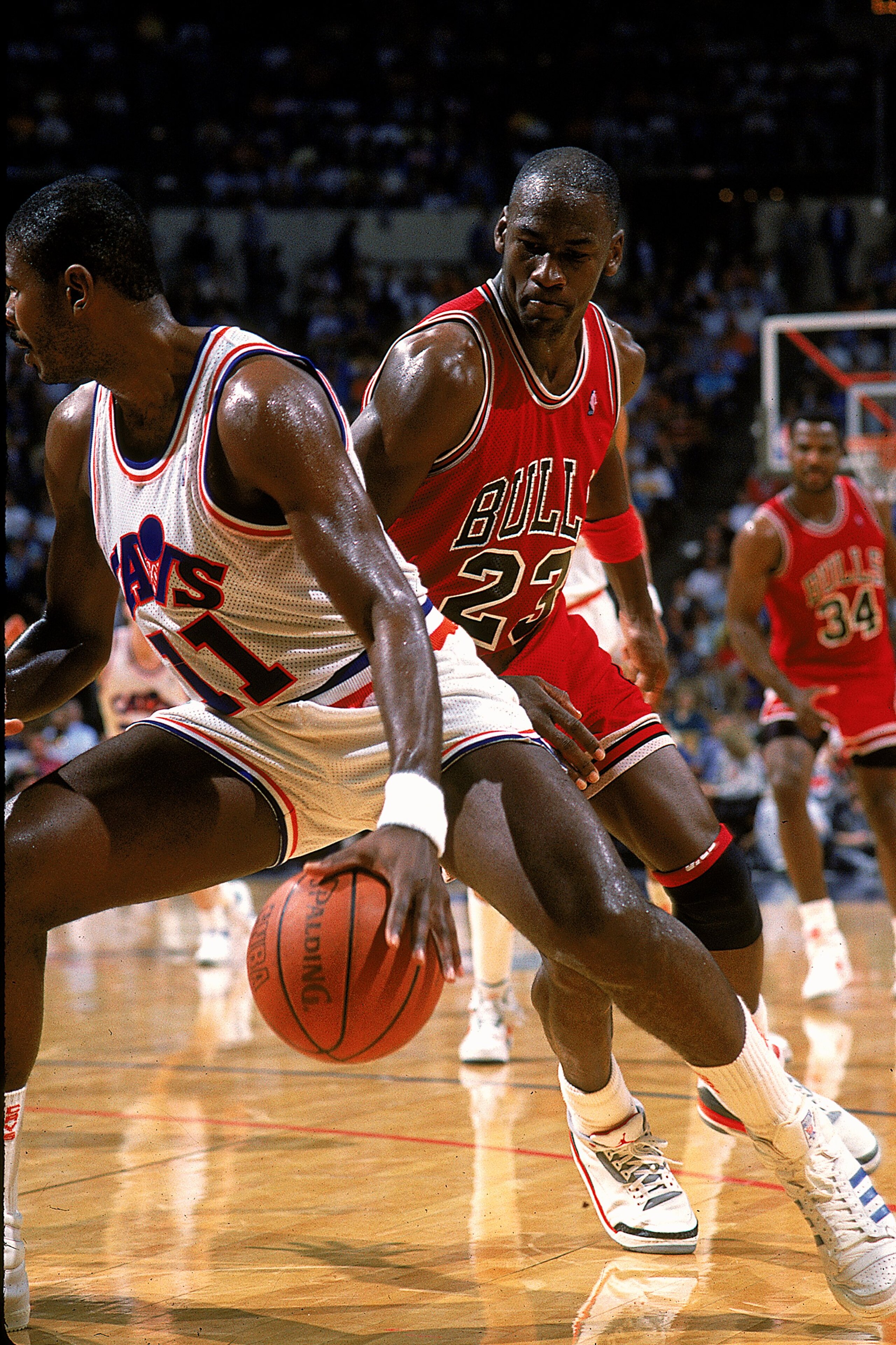 1987-1988:  Michael Jordan #23 of the Chicago Bulls moves to steel the ball during the game.   Mandatory Credit: Andy Lyons  /Allsport
