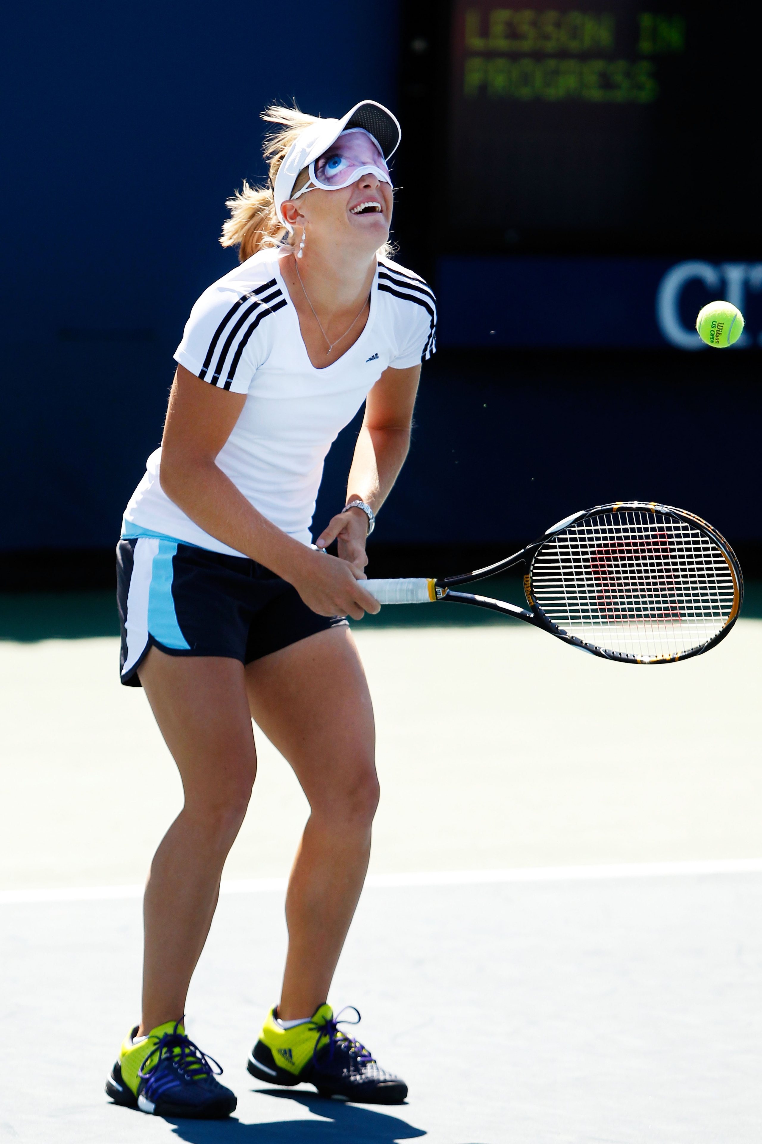 NEW YORK - SEPTEMBER 06:  Melanie Oudin plays tennis blindfolded against television host Ellen Degeneres (not pictured) during day eight of the 2010 U.S. Open at the USTA Billie Jean King National Tennis Center on September 6, 2010 in the Flushing neighbo