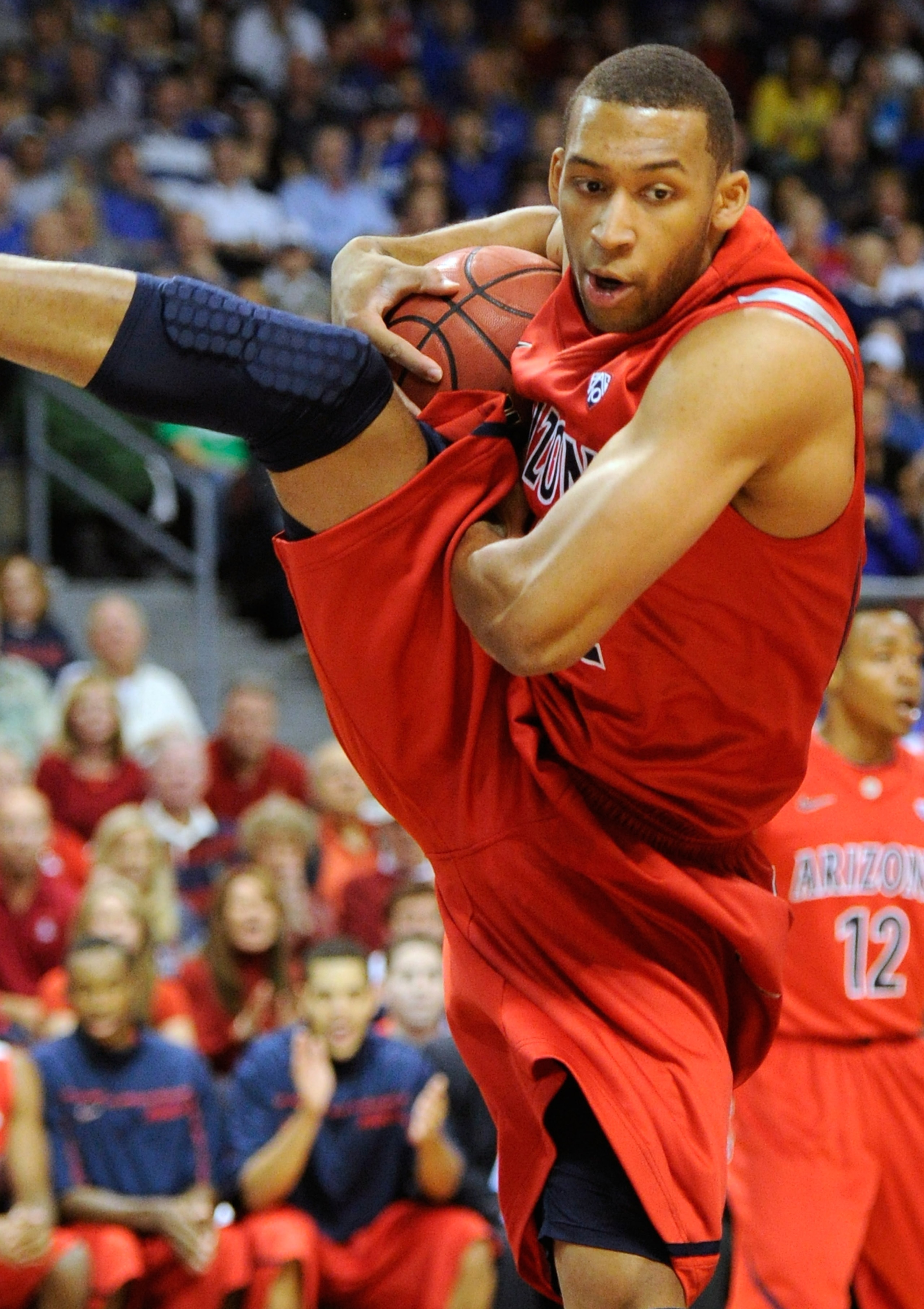 LAS VEGAS - NOVEMBER 27:  Jamelle Horne #42 of the Arizona Wildcats grabs a rebound against the Kansas Jayhawks during the championship game of the Las Vegas Invitational at The Orleans Arena November 27, 2010 in Las Vegas, Nevada. Kansas won 87-79.  (Pho
