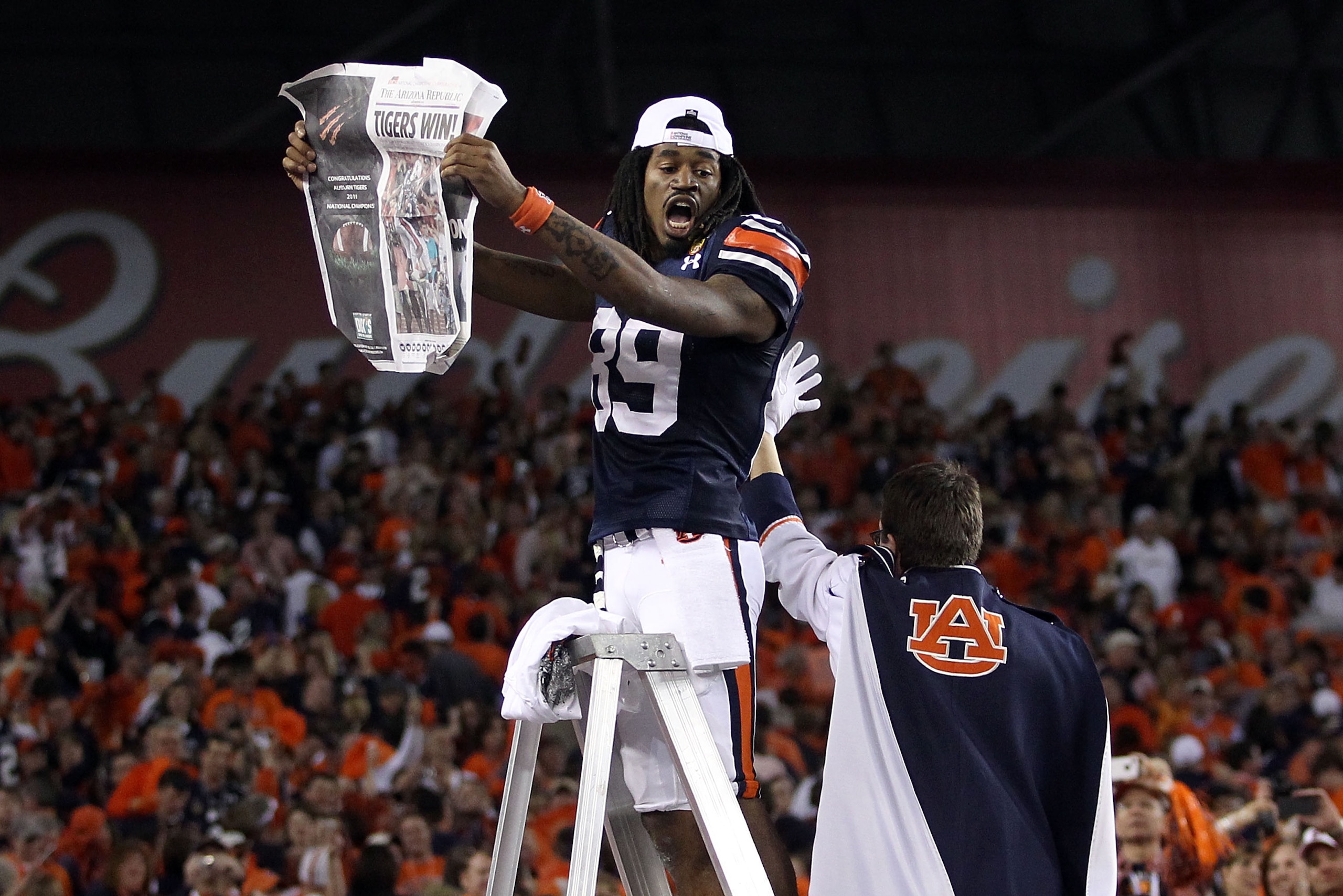 GLENDALE, AZ - JANUARY 10: Darvin Adams #89 of the Auburn Tigers celebrates the Tigers 22-19 victory against the Oregon Ducks in the Tostitos BCS National Championship Game at University of Phoenix Stadium on January 10, 2011 in Glendale, Arizona. (Phot GLENDALE, AZ - JANUARY 10: Darvin Adams #89 of the Auburn Tigers celebrates the Tigers 22-19 victory against the Oregon Ducks in the Tostitos BCS National Championship Game at University of Phoenix Stadium on January 10, 2011 in Glendale, Arizona. (Phot