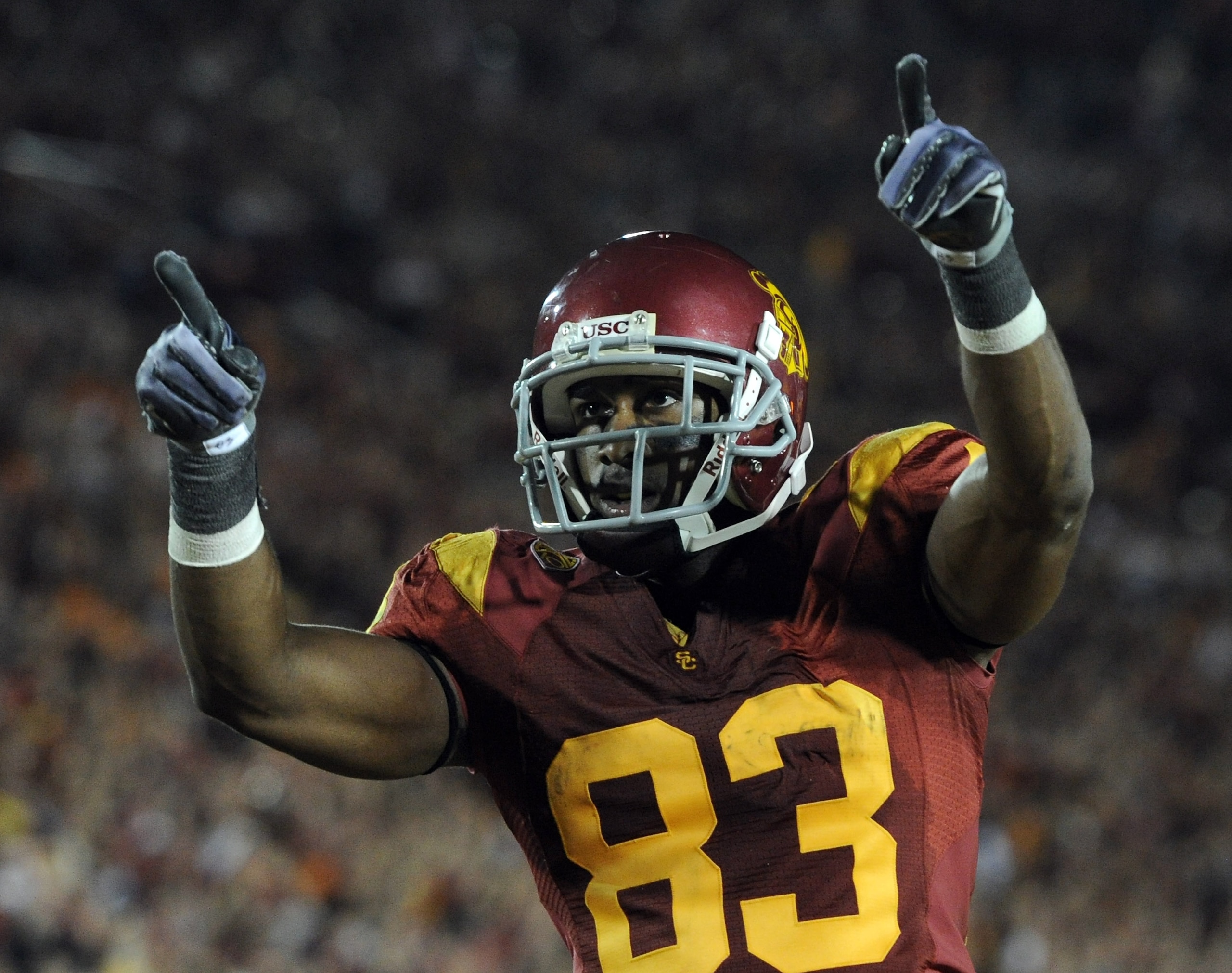 LOS ANGELES, CA - OCTOBER 30: Ronald Johnson #83 of the USC Trojans celebrates his two point conversion for a 32-29 lead over the Oregon Ducks during the third quarter at Los Angeles Memorial Coliseum on October 30, 2010 in Los Angeles, California. (Phot LOS ANGELES, CA - OCTOBER 30: Ronald Johnson #83 of the USC Trojans celebrates his two point conversion for a 32-29 lead over the Oregon Ducks during the third quarter at Los Angeles Memorial Coliseum on October 30, 2010 in Los Angeles, California. (Phot