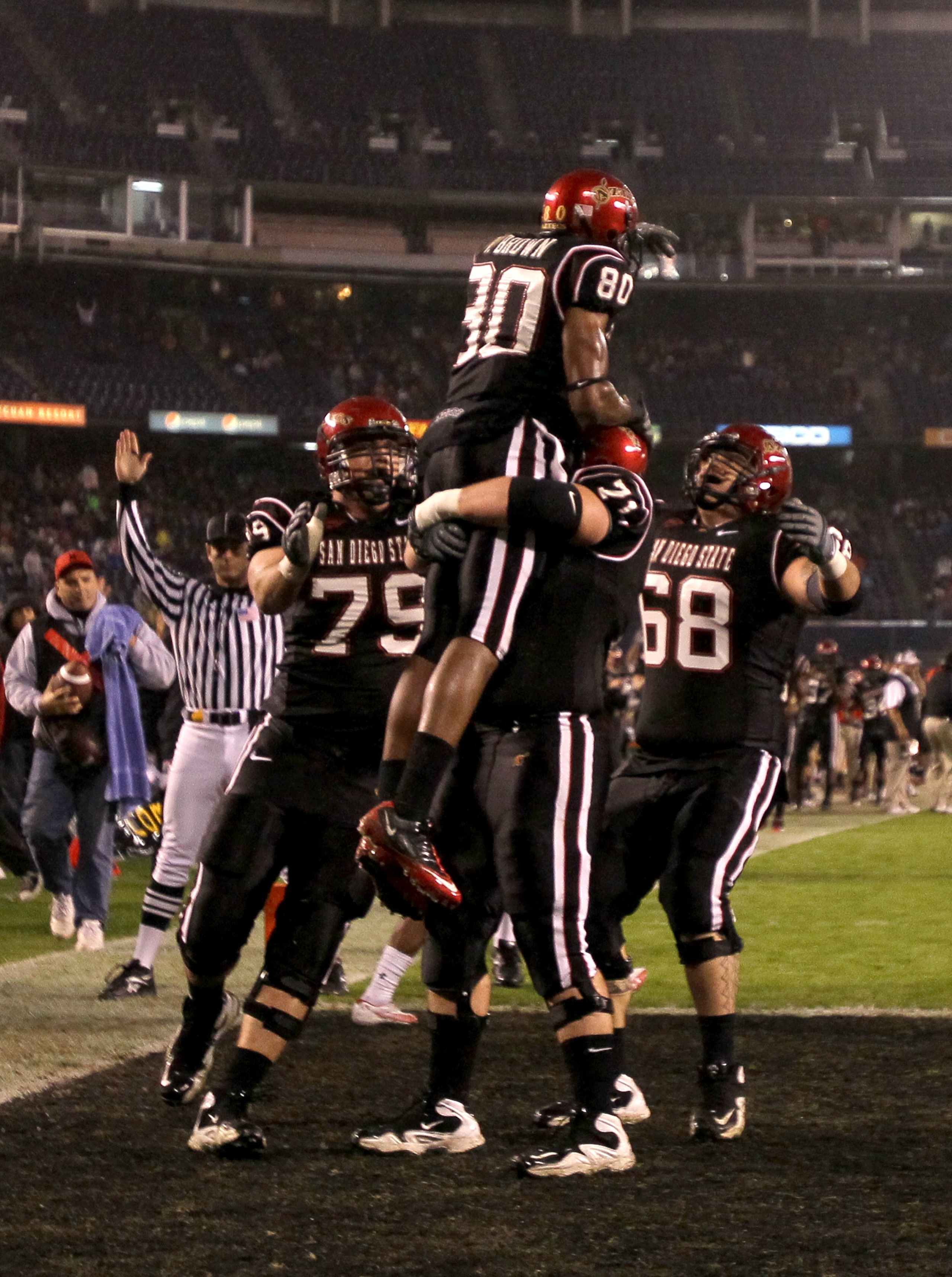 SAN DIEGO - NOVEMBER 20: Wide receiver Vincent Brown #80 of the San Diego State Aztecs celebrates after his first touchdown of the game, on a ten yard reception in the first quarter against the Utah Utes at Qualcomm Stadium on November 20, 2010 in San Di SAN DIEGO - NOVEMBER 20: Wide receiver Vincent Brown #80 of the San Diego State Aztecs celebrates after his first touchdown of the game, on a ten yard reception in the first quarter against the Utah Utes at Qualcomm Stadium on November 20, 2010 in San Di