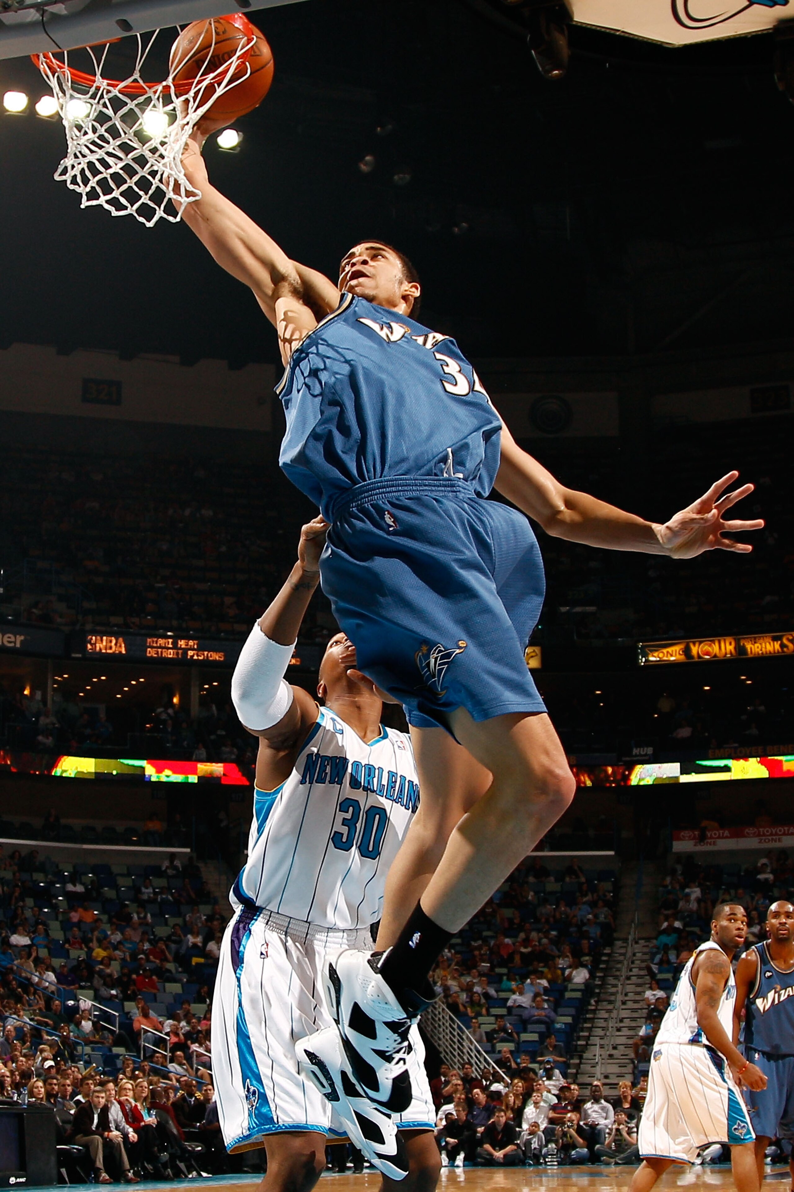 NEW ORLEANS - MARCH 31: JaVale McGee #34 of the Washington Wizards attempts a shot over David West #30 of the New Orleans Hornets at New Orleans Arena on March 31, 2010 in New Orleans, Louisiana. NOTE TO USER: User expressly acknowledges and agrees that NEW ORLEANS - MARCH 31: JaVale McGee #34 of the Washington Wizards attempts a shot over David West #30 of the New Orleans Hornets at New Orleans Arena on March 31, 2010 in New Orleans, Louisiana. NOTE TO USER: User expressly acknowledges and agrees that