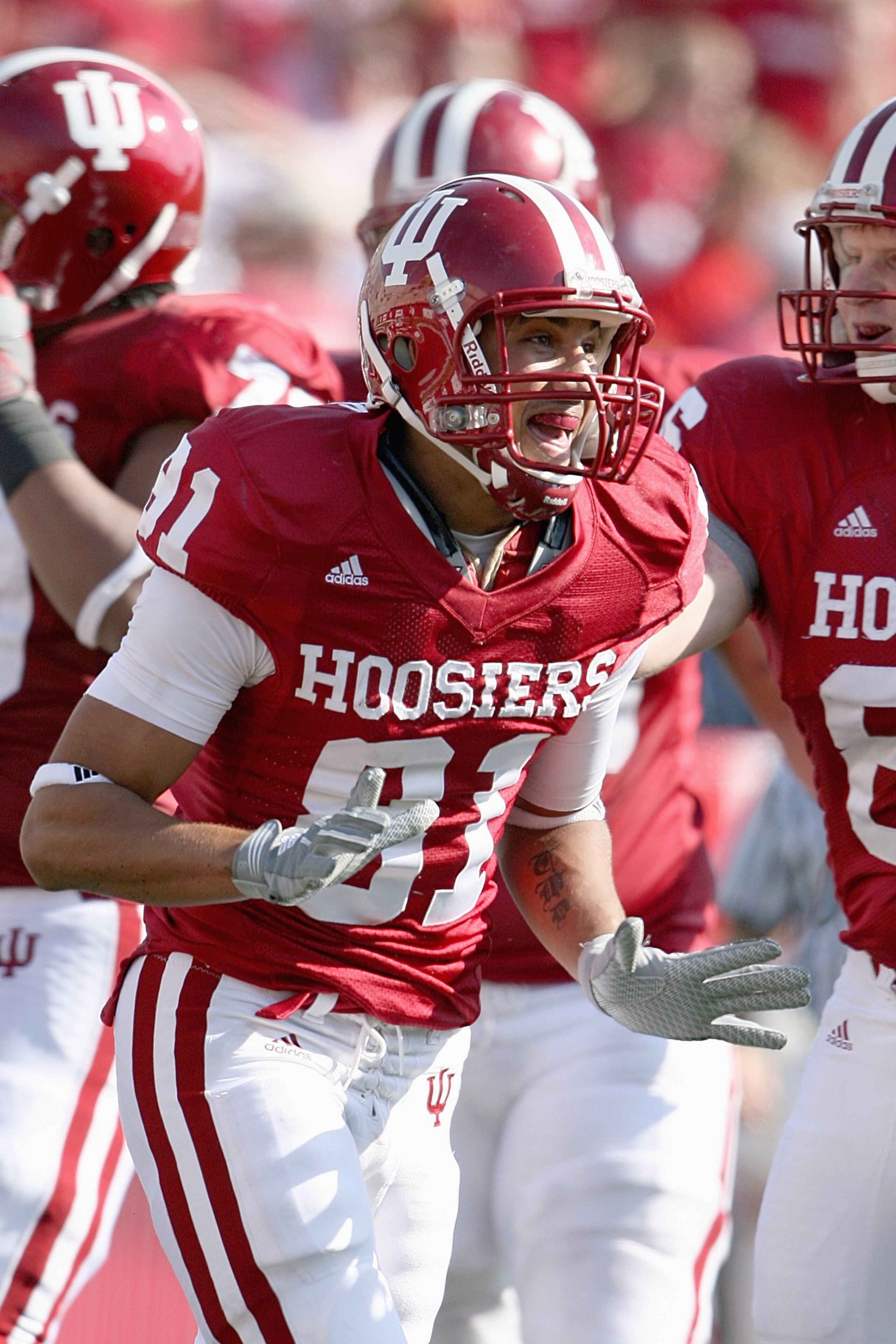 BLOOMINGTON, IN - NOVEMBER 01: Tandon Doss #81 of the Indiana Hooisers celebrates on the field during the game against the Central Michigan Chippewas at Memorial Stadium on November 1, 2008 in Bloomington, Indiana. (Photo by Andy Lyons/Getty Images) BLOOMINGTON, IN - NOVEMBER 01: Tandon Doss #81 of the Indiana Hooisers celebrates on the field during the game against the Central Michigan Chippewas at Memorial Stadium on November 1, 2008 in Bloomington, Indiana. (Photo by Andy Lyons/Getty Images)