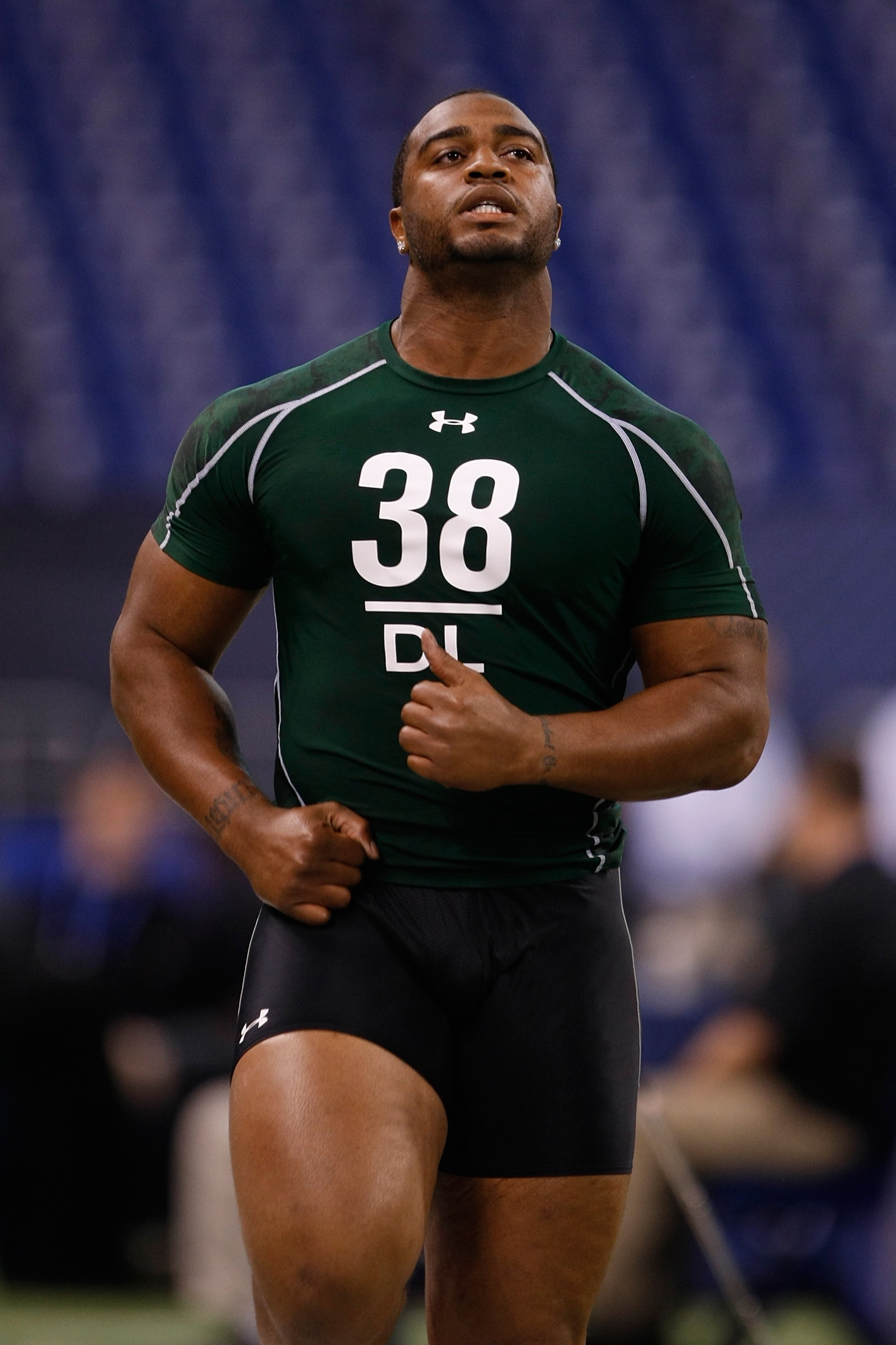 INDIANAPOLIS, IN - MARCH 1: Defensive lineman Mike Neal of Purdue runs the 40 yard dash during the NFL Scouting Combine presented by Under Armour at Lucas Oil Stadium on March 1, 2010 in Indianapolis, Indiana. (Photo by Scott Boehm/Getty Images)