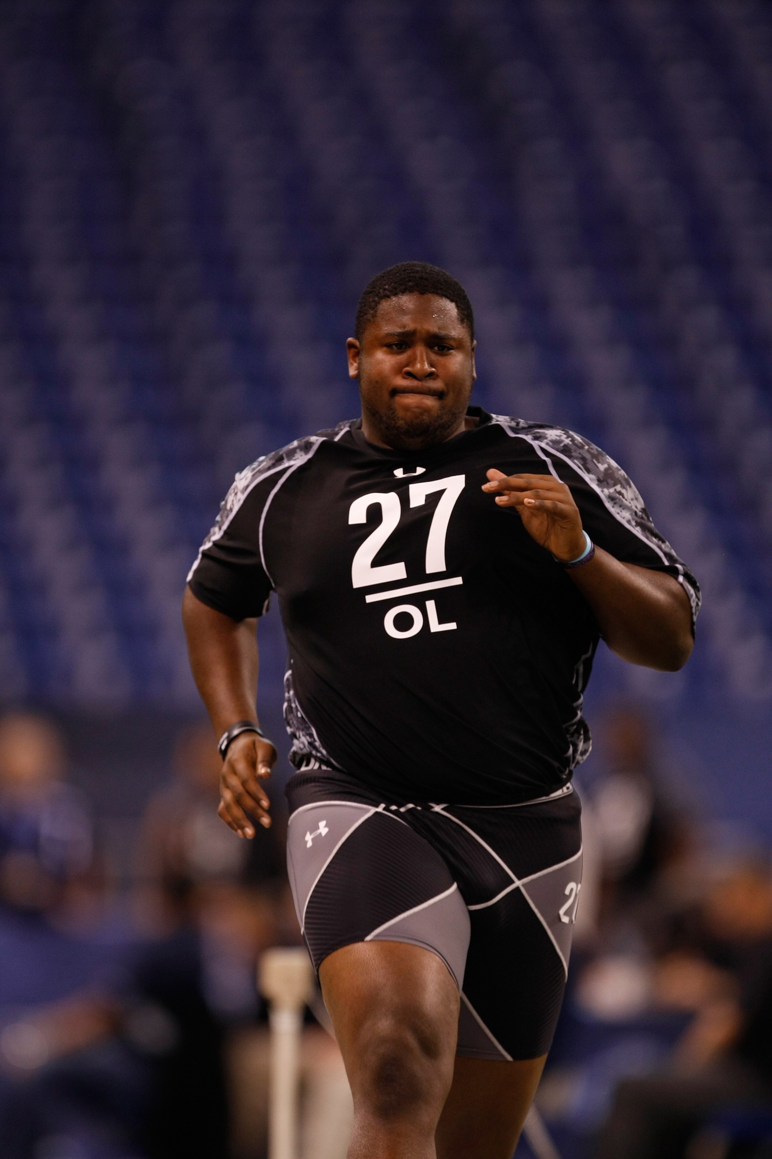 INDIANAPOLIS, IN - FEBRUARY 27: Offensive lineman Marshall Newhouse of Texas Christian runs the 40 yard dash during the NFL Scouting Combine presented by Under Armour at Lucas Oil Stadium on February 27, 2010 in Indianapolis, Indiana. (Photo by Scott Boeh