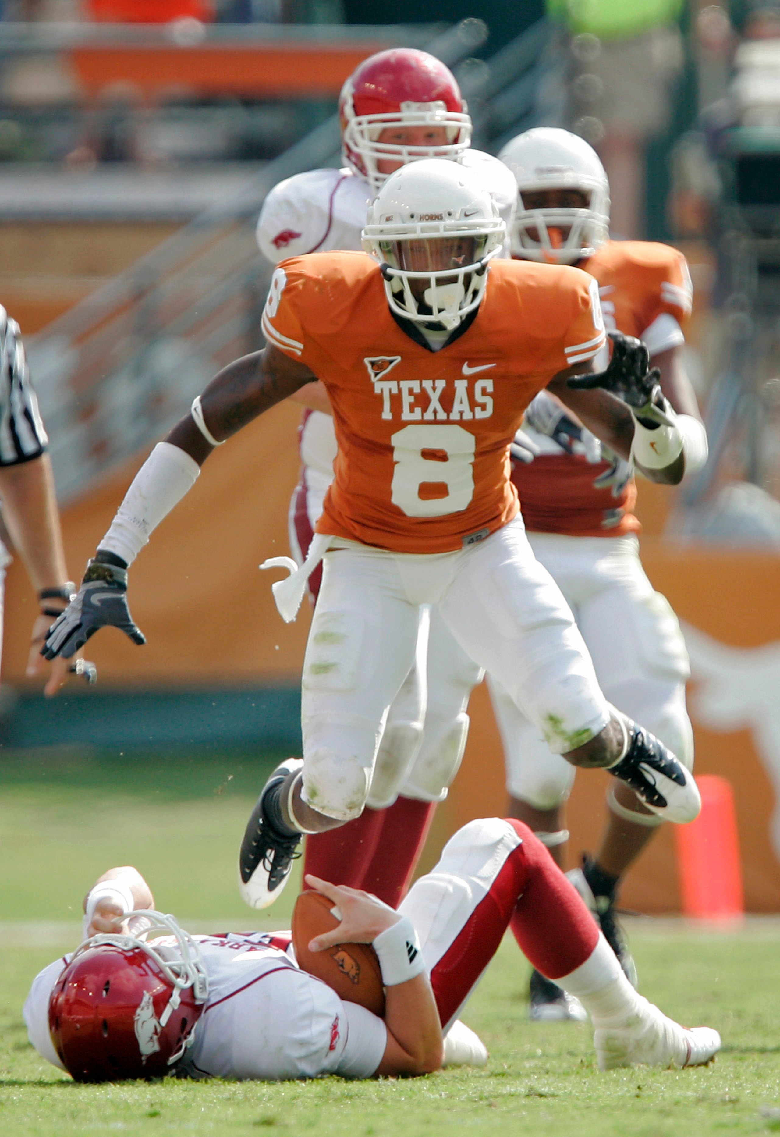 AUSTIN, TX - SEPTEMBER 27:  Cornerback Chykie Brown #8 of the Texas Longhorns celebrates after sacking quarterback Casey Dick #11 of the Arkansas Razorbacks for a loss of 8 yards in the second quarter on September 27, 2008 at Darrell K Royal-Texas Memoria