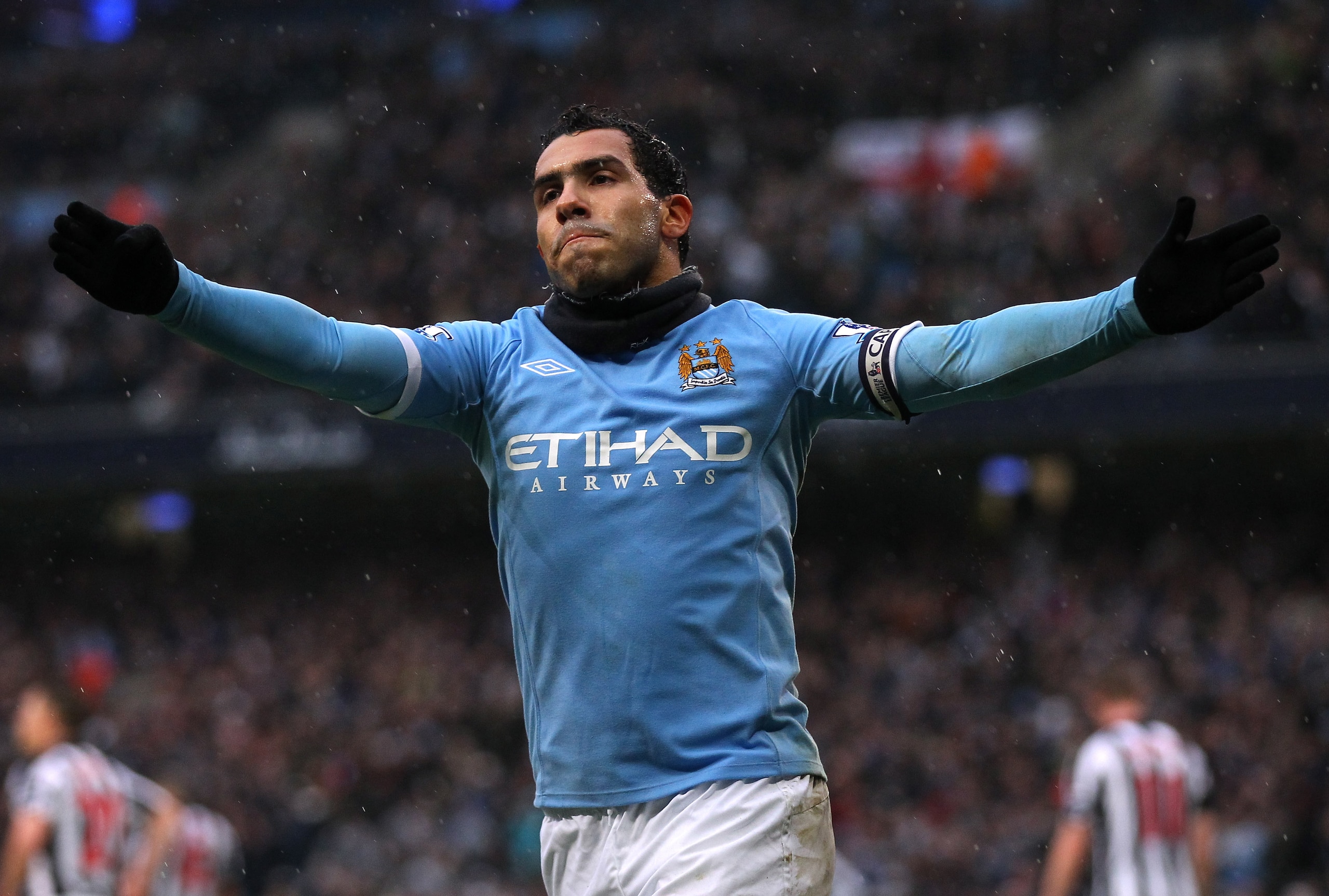 MANCHESTER, ENGLAND - FEBRUARY 05:  Carlos Tevez of Manchester City celebrates after scoring his third goal during the Barclays Premier League match between Manchester City and West Bromwich Albion at the City of Manchester Stadium on February 5, 2011 in