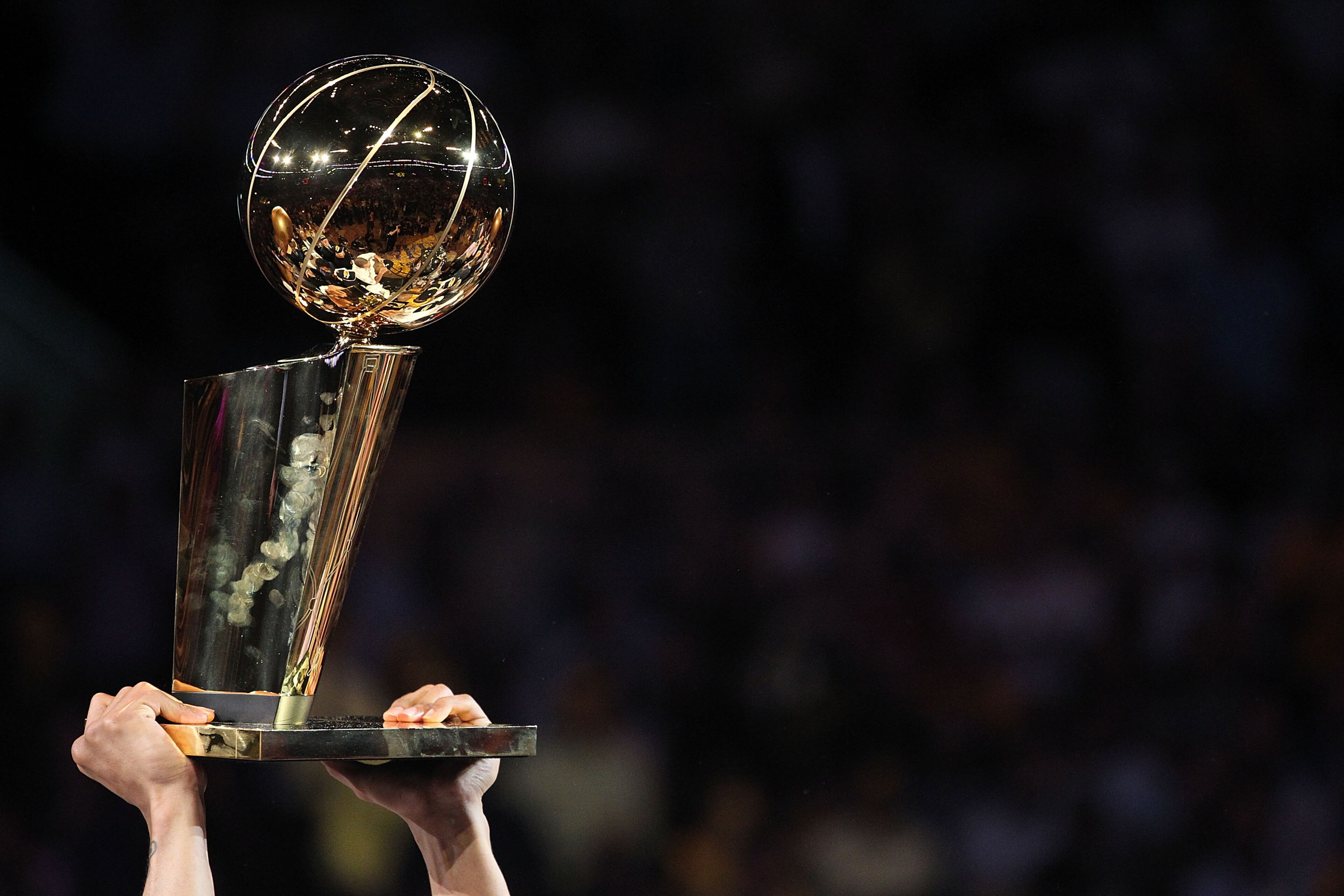 LOS ANGELES, CA - JUNE 17:  The Los Angeles Lakers hold up the Larry O'Brien Trophy after the Lakers defeated the Boston Celtics in Game Seven of the 2010 NBA Finals at Staples Center on June 17, 2010 in Los Angeles, California.  NOTE TO USER: User expres