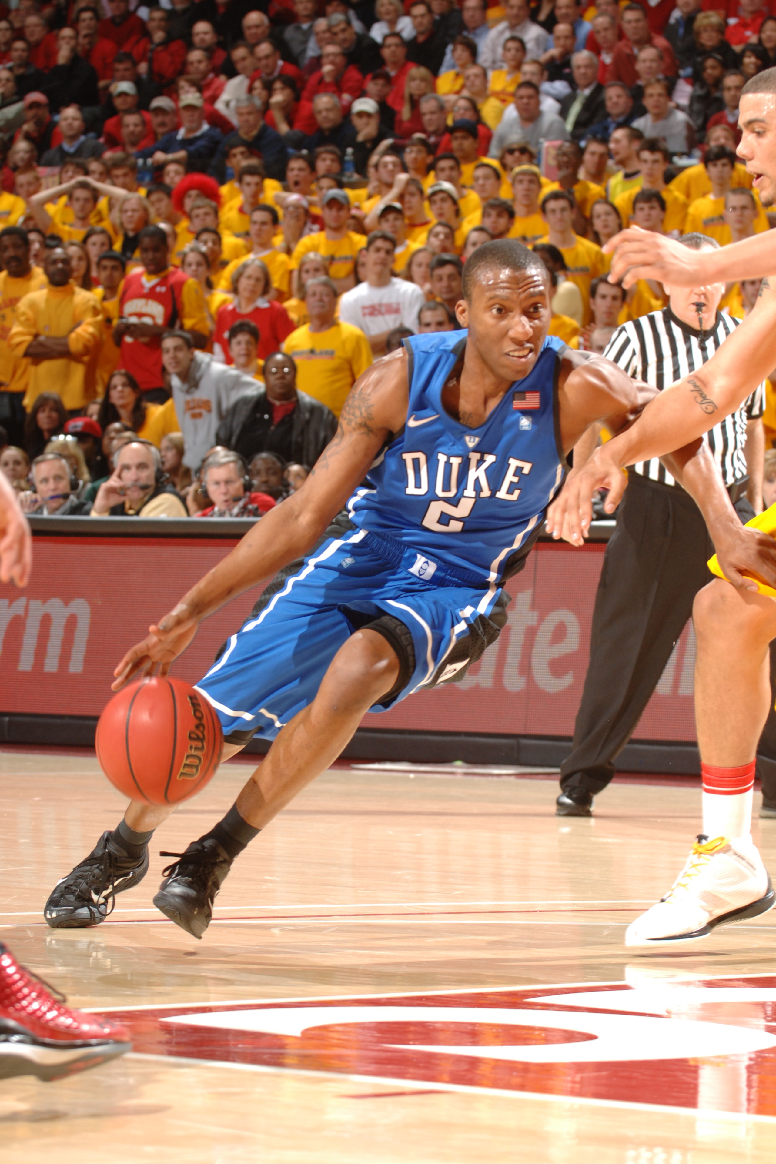 COLLEGE PARK, MD - FEBRUARY 2: Nolan Smith #2 of the Duke Blue Devils dribbles to the basket during a college basketball game against the Maryland Terrapins on February 2, 2011 at the Comcast Arena in College Park, Maryland. The Blue Devils won 80-62. (Ph