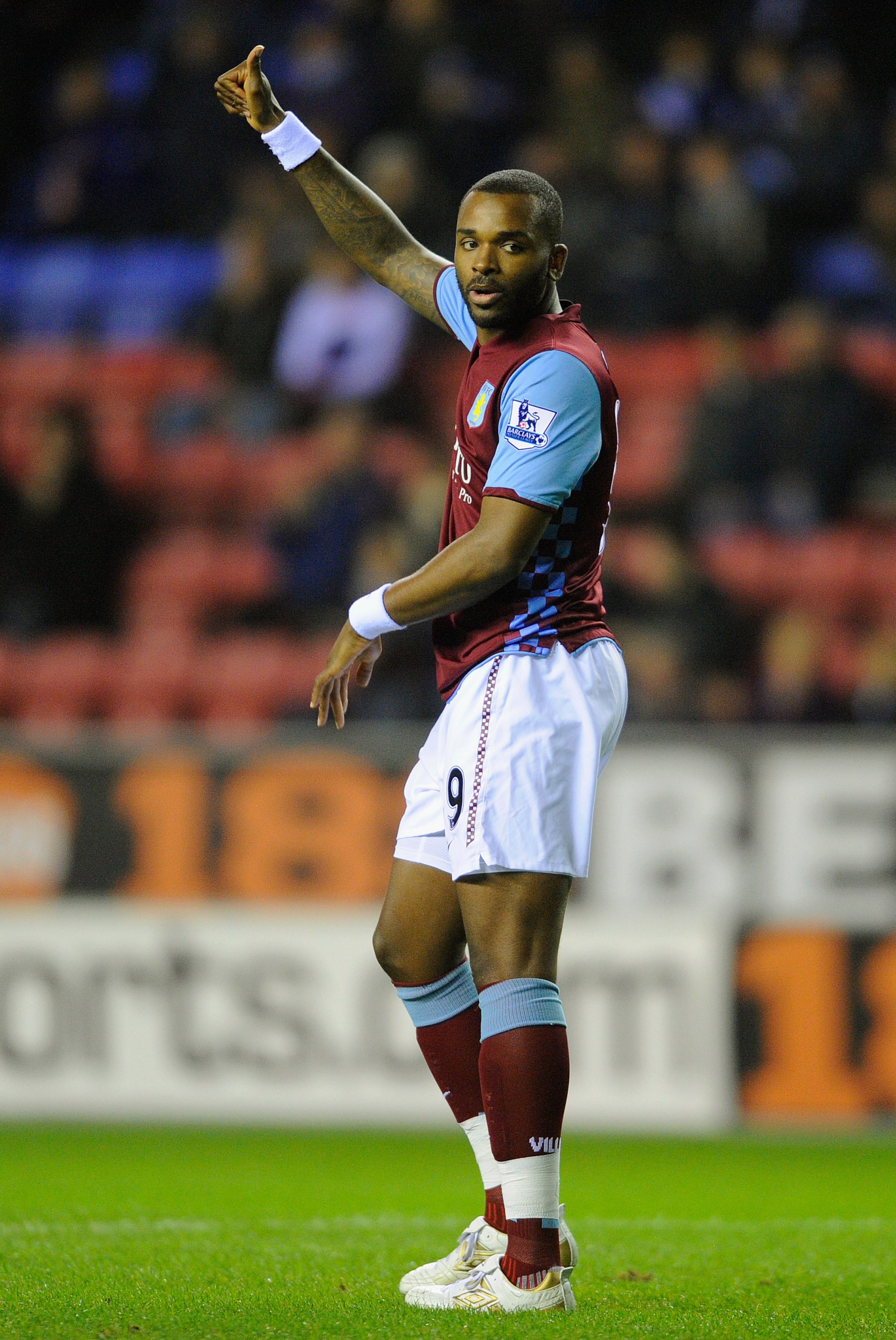 WIGAN, ENGLAND - JANUARY 25:  Darren Bent of Aston Villa gestures during the Barclays Premier League match between Wigan Athletic and Aston Villa at the DW Stadium on January 25, 2011 in Wigan, England.  (Photo by Michael Regan/Getty Images)