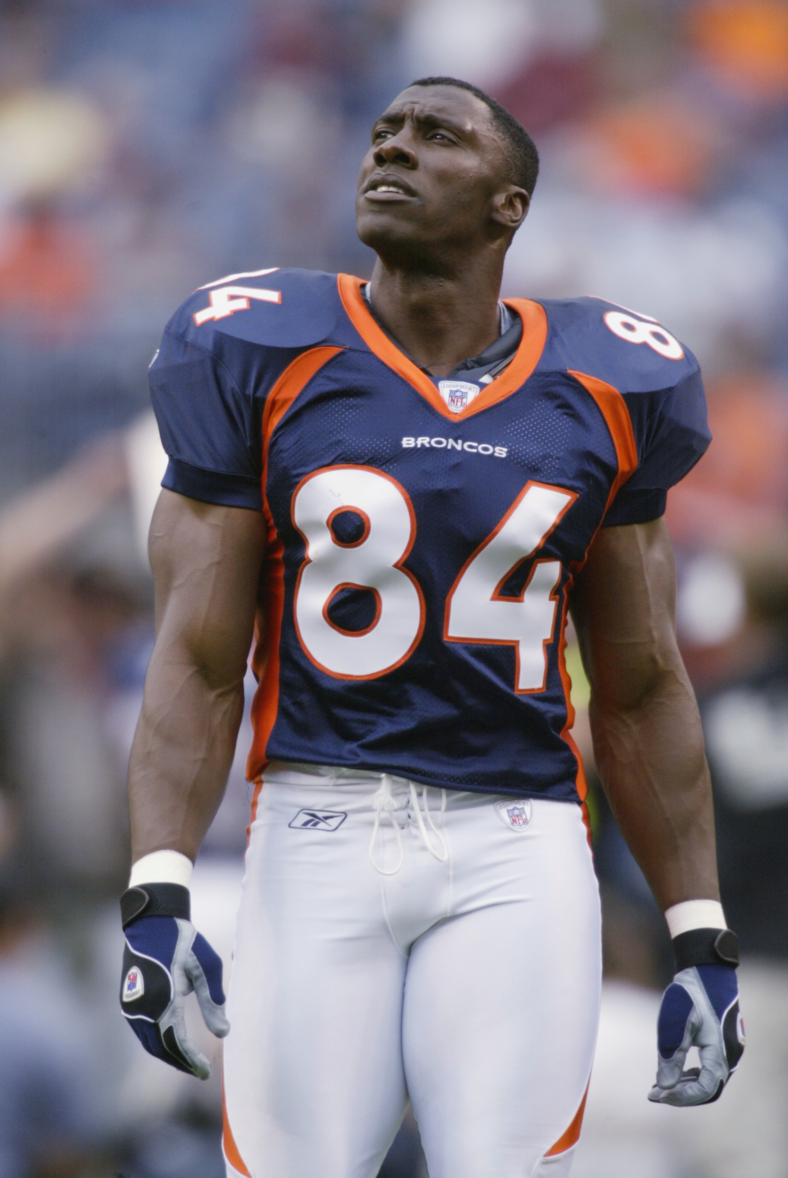 DENVER - AUGUST 19:  Tight end Shannon Sharpe #84 of the Denver Broncos walks on the field before the preseason Monday Night Football game against the San Francisco 49ers August 19, 2002, at Mile High Stadium in Denver, Colorado.   The 49ers won 12-7. (Ph