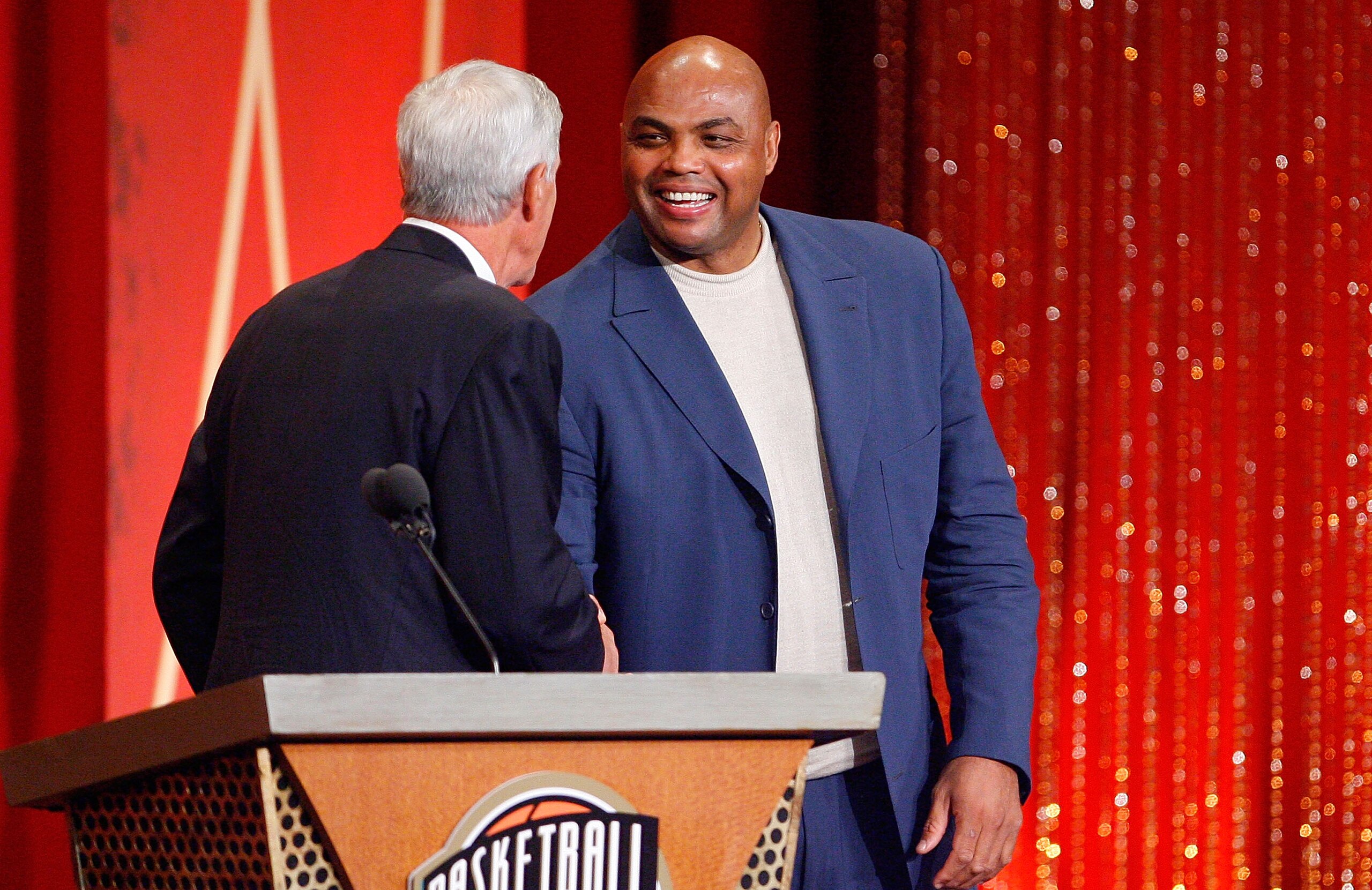 SPRINGFIELD, MA - SEPTEMBER 11:  Charles Barkley presents Coach Jerry Sloan to the Naismith Memorial Basketball Hall of Fame during an induction ceremony on September 11, 2009 in Springfield, Massachusetts. NOTE TO USER: User expressly acknowledges and ag