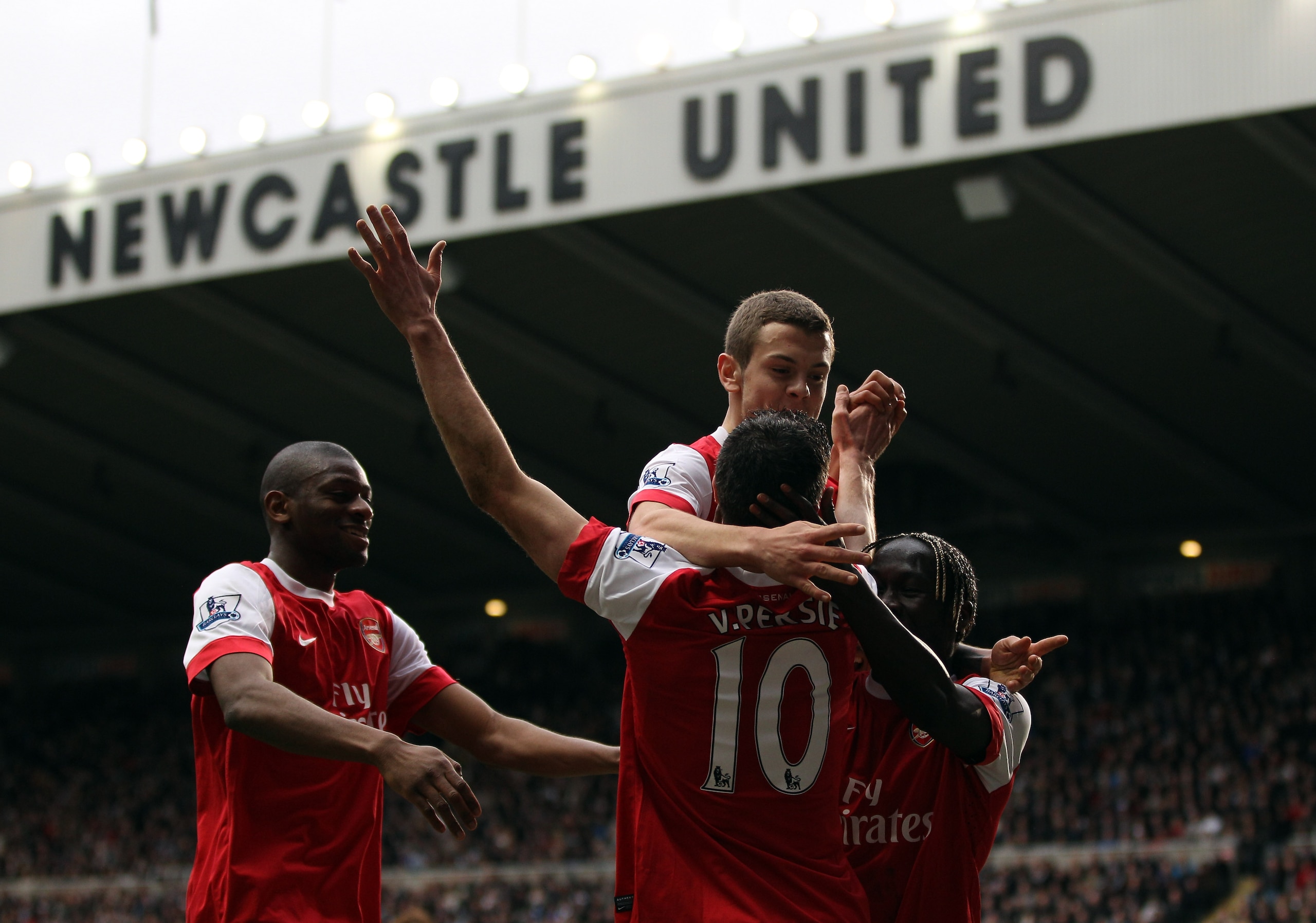 NEWCASTLE UPON TYNE, ENGLAND - FEBRUARY 05:  Robin Van Persie of Arsenal celebrates scoring the fourth goal during the Barclays Premier League match between Newcastle United and Arsenal at St James' Park on February 5, 2011 in Newcastle upon Tyne, England