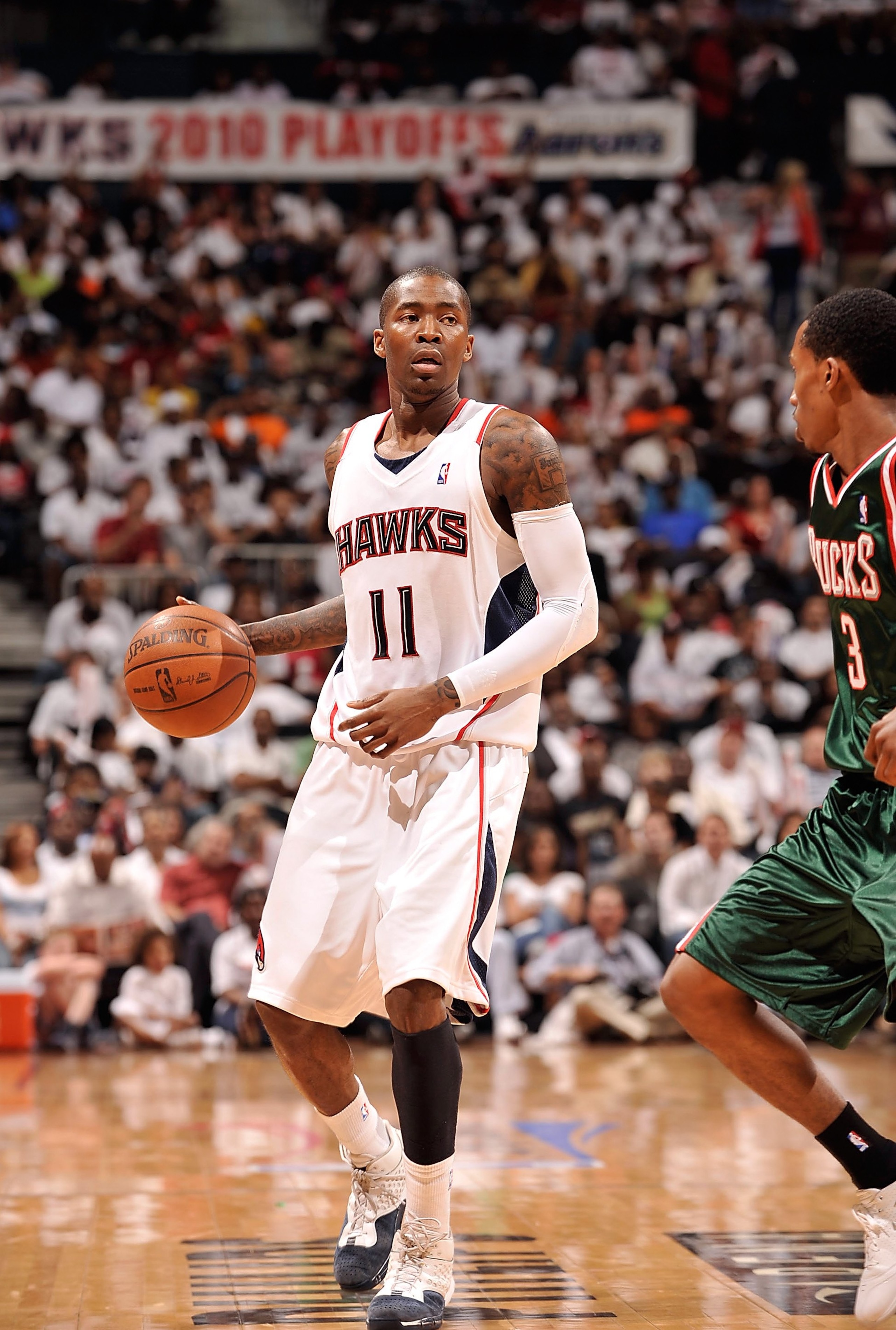 ATLANTA - APRIL 17: Jamal Crawford #11 of the Atlanta Hawks dribbles against the Milwaukee Bucks in Game One of the Eastern Conference Quarterfinals during the 2010 NBA Playoffs on April 17, 2010 at Philips Arena in Atlanta, Georgia. The Hawks won 102-92 ATLANTA - APRIL 17: Jamal Crawford #11 of the Atlanta Hawks dribbles against the Milwaukee Bucks in Game One of the Eastern Conference Quarterfinals during the 2010 NBA Playoffs on April 17, 2010 at Philips Arena in Atlanta, Georgia. The Hawks won 102-92