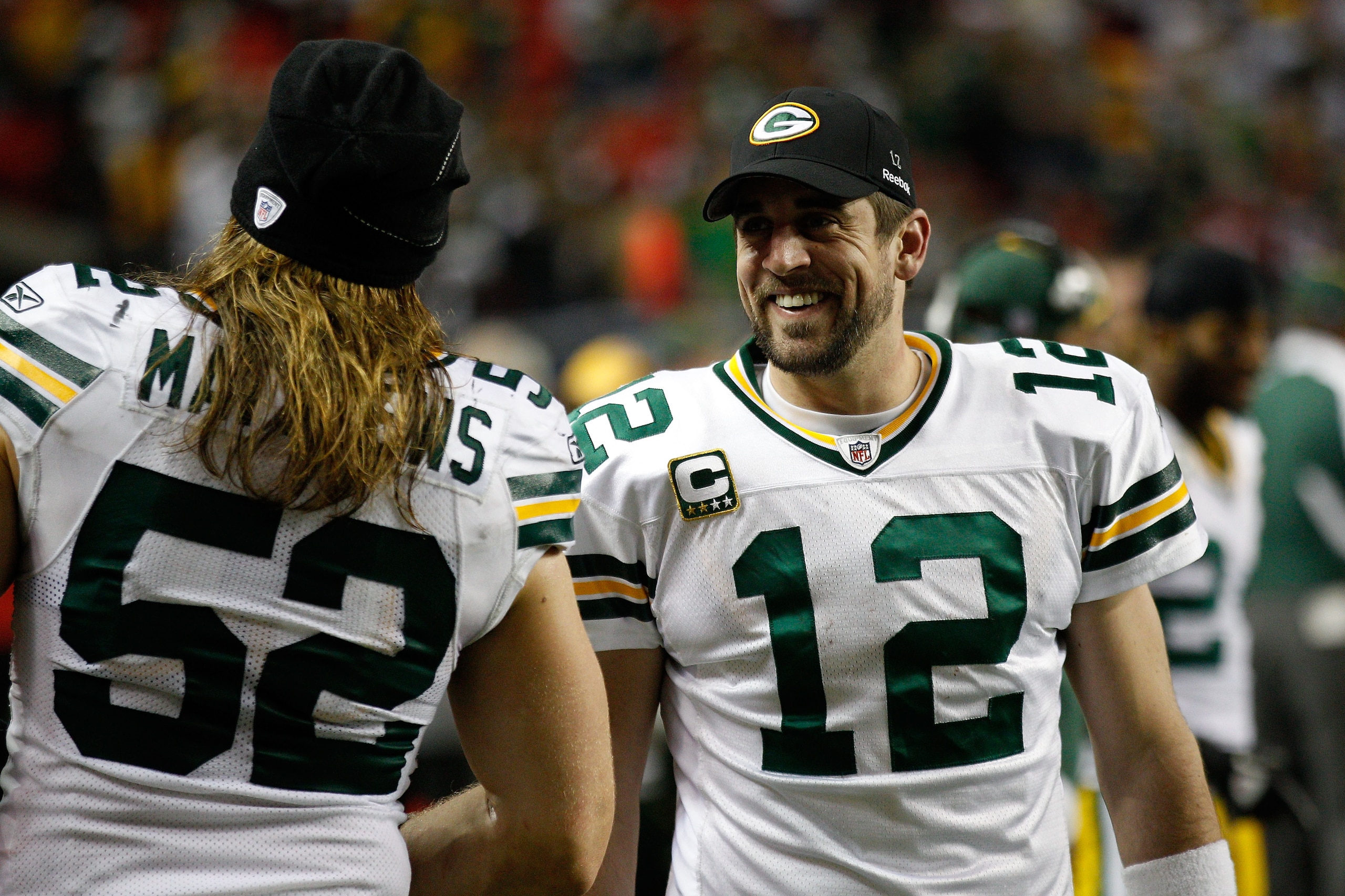 ATLANTA, GA - JANUARY 15: Quarterback Aaron Rodgers #12 and Clay Matthews #52 of the Green Bay Packers talk on the sideline against the Atlanta Falcons during their 2011 NFC divisional playoff game at Georgia Dome on January 15, 2011 in Atlanta, Georgia. ATLANTA, GA - JANUARY 15: Quarterback Aaron Rodgers #12 and Clay Matthews #52 of the Green Bay Packers talk on the sideline against the Atlanta Falcons during their 2011 NFC divisional playoff game at Georgia Dome on January 15, 2011 in Atlanta, Georgia.