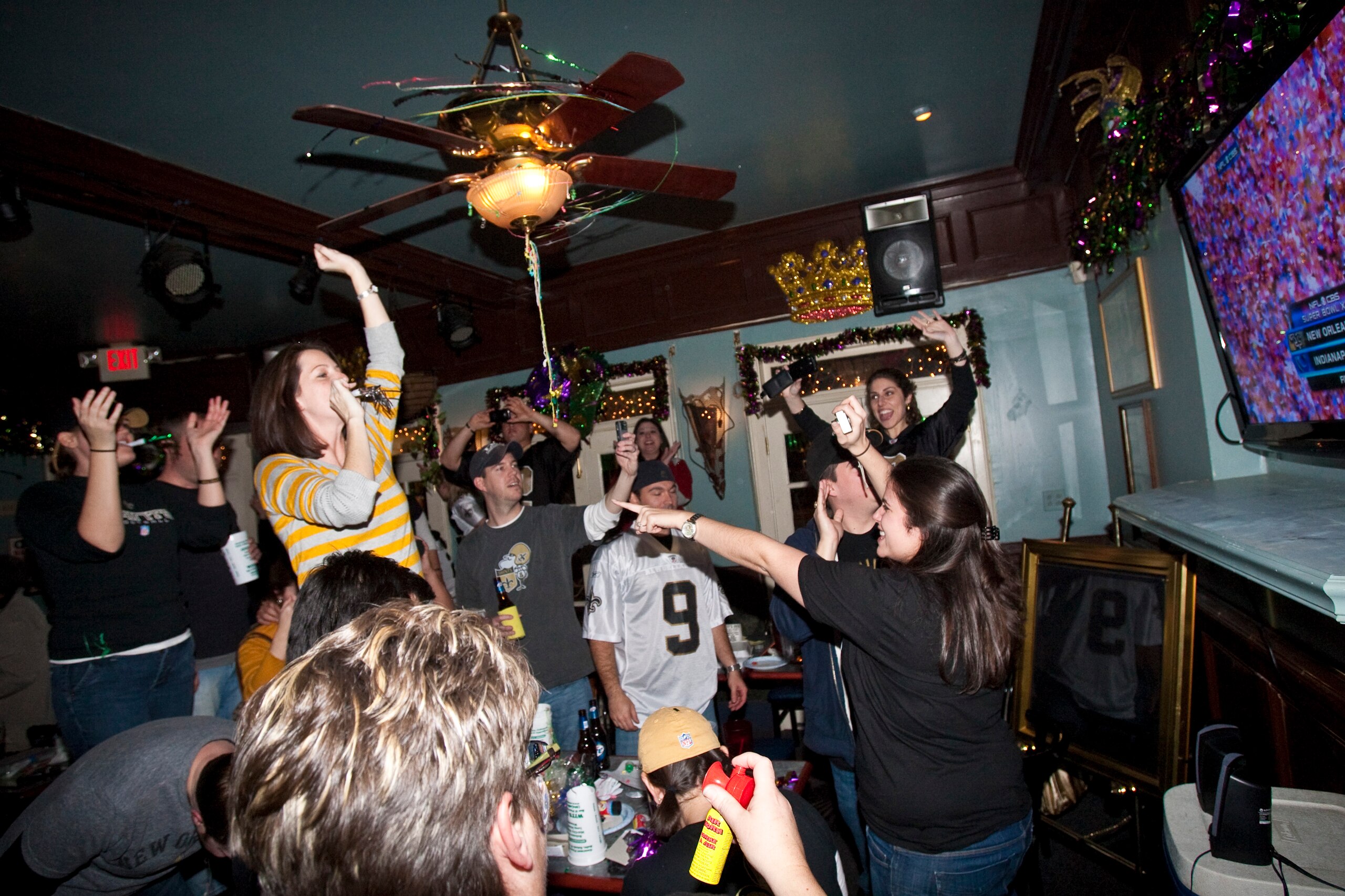 NEW ORLEANS - FEBRUARY 07: Exuberant New Orleans Saints fans celebrate the final winning score of Super Bowl XLIV at the Mid-City neighborhood bar Wit's Inn on February 7, 2010 in New Orleans, Louisiana. (Photo by Skip Bolen/Getty Images) NEW ORLEANS - FEBRUARY 07: Exuberant New Orleans Saints fans celebrate the final winning score of Super Bowl XLIV at the Mid-City neighborhood bar Wit's Inn on February 7, 2010 in New Orleans, Louisiana. (Photo by Skip Bolen/Getty Images)