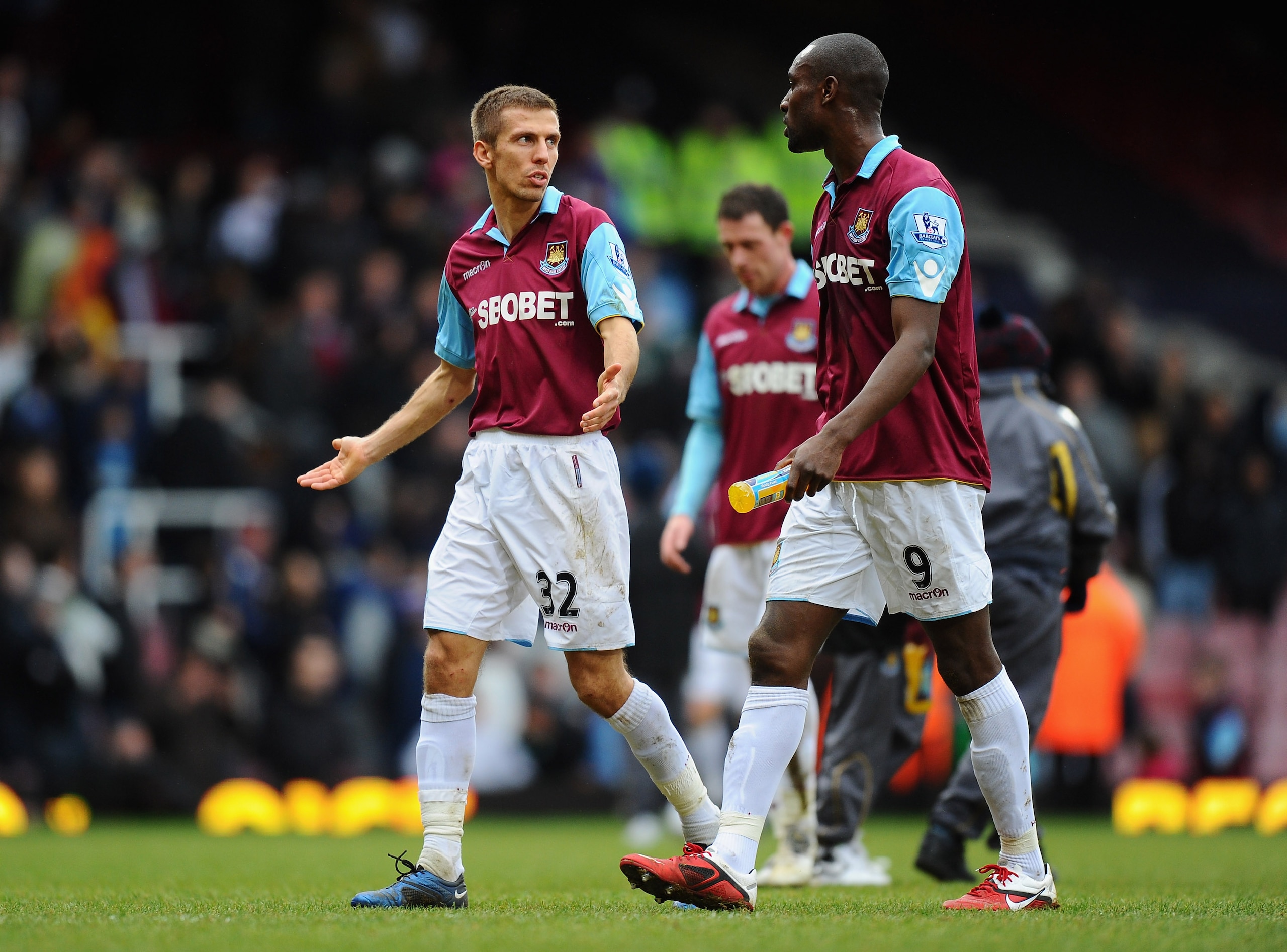LONDON, ENGLAND - FEBRUARY 06:  Gary O'Neill and Carlton Cole of West Ham United walk off the pitch dejected after defeat in the Barclays Premier League match between West Ham United and Birmingham City at the Boleyn Ground on February 6, 2011 in London,