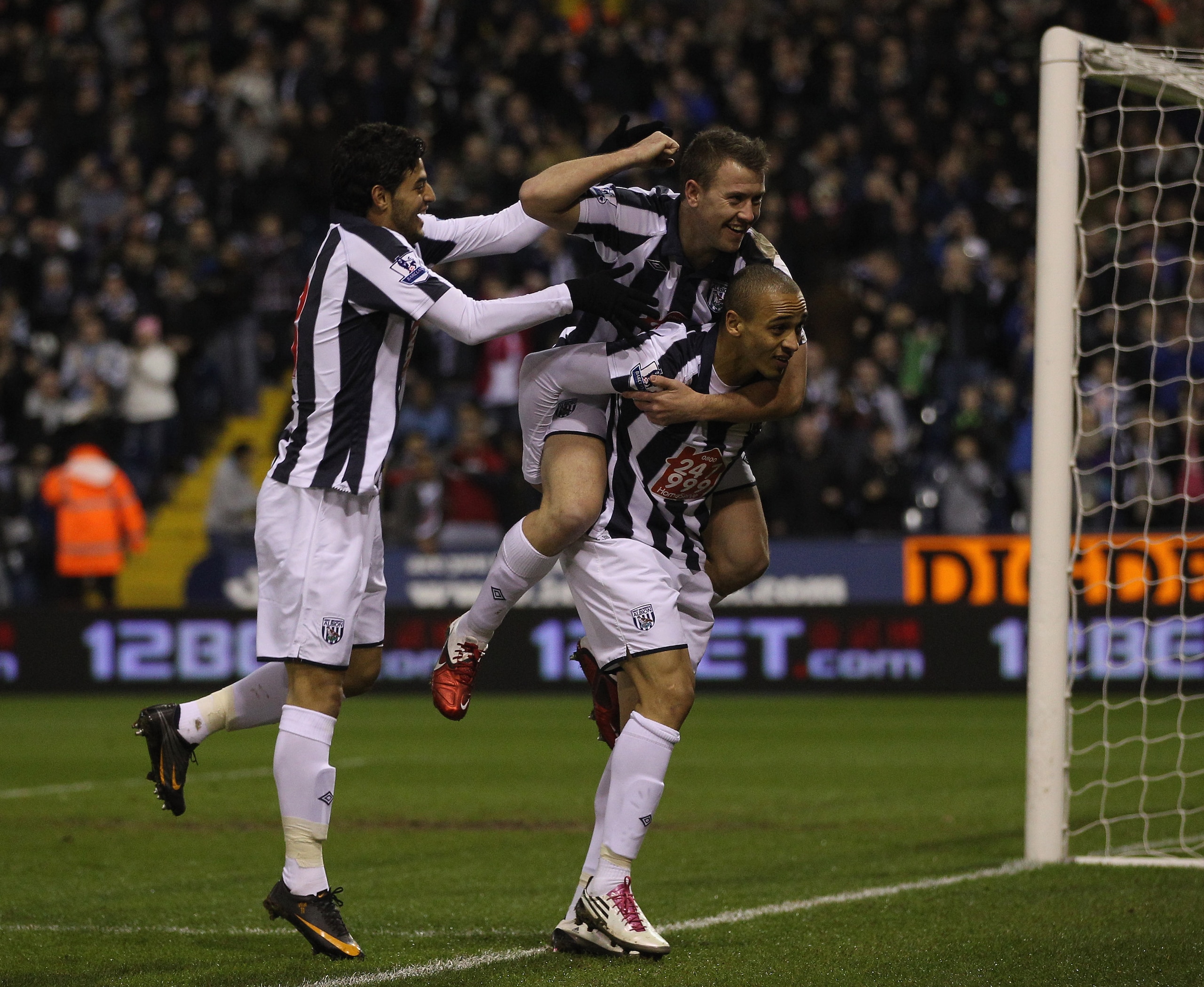 WEST BROMWICH, ENGLAND - FEBRUARY 01:  Peter Odemwingie of West Brom celebrates scoring the first goal during the Barclays Premier League match between West Bromwich Albion and Wigan Athletic at The Hawthorns on February 1, 2011 in West Bromwich, England.
