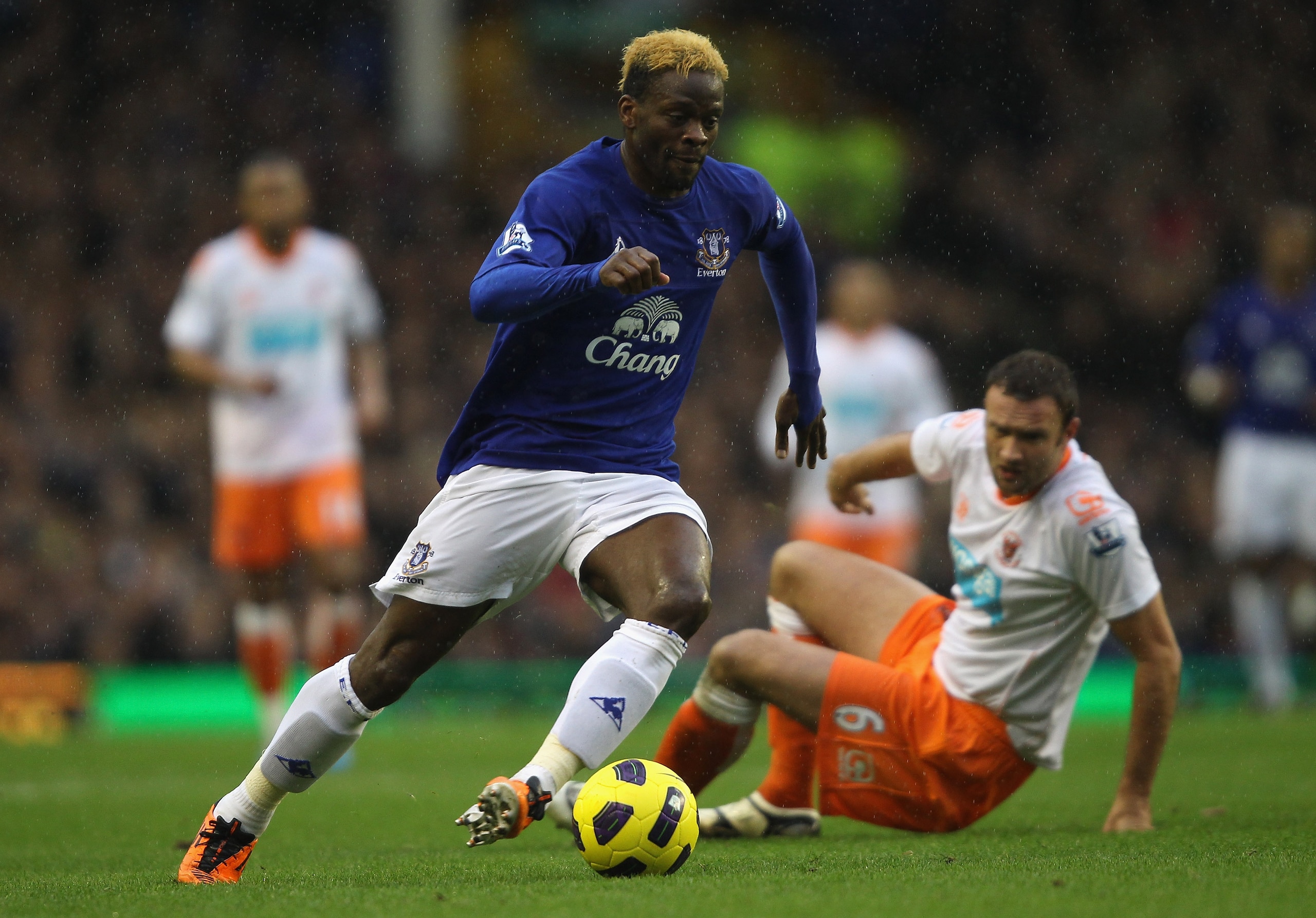 LIVERPOOL, ENGLAND - FEBRUARY 05:  Louis Saha of Everton moves away from Ian Evatt of Blackpool during the Barclays Premier League match between Everton and Blackpool at Goodison Park on February 5, 2011 in Liverpool, England.  (Photo by Clive Brunskill/G
