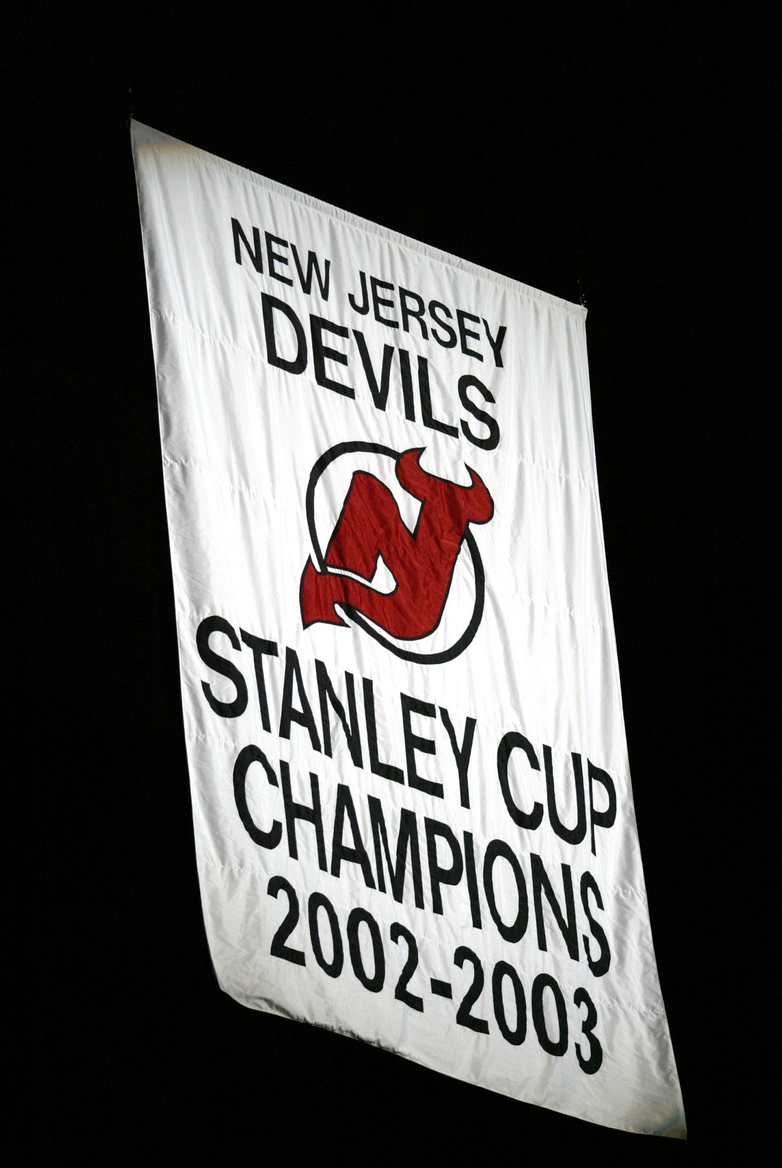 EAST RUTHERFORD, NJ - OCTOBER 16:  The New Jersey Devils raised their 2002-2003 Stanley Cup Champions banner before the game against the Toronto Maple Leafs October 16, 2003 at the Continental Arena in East Rutherford, New Jersey.  (Photo by Chris Trotman