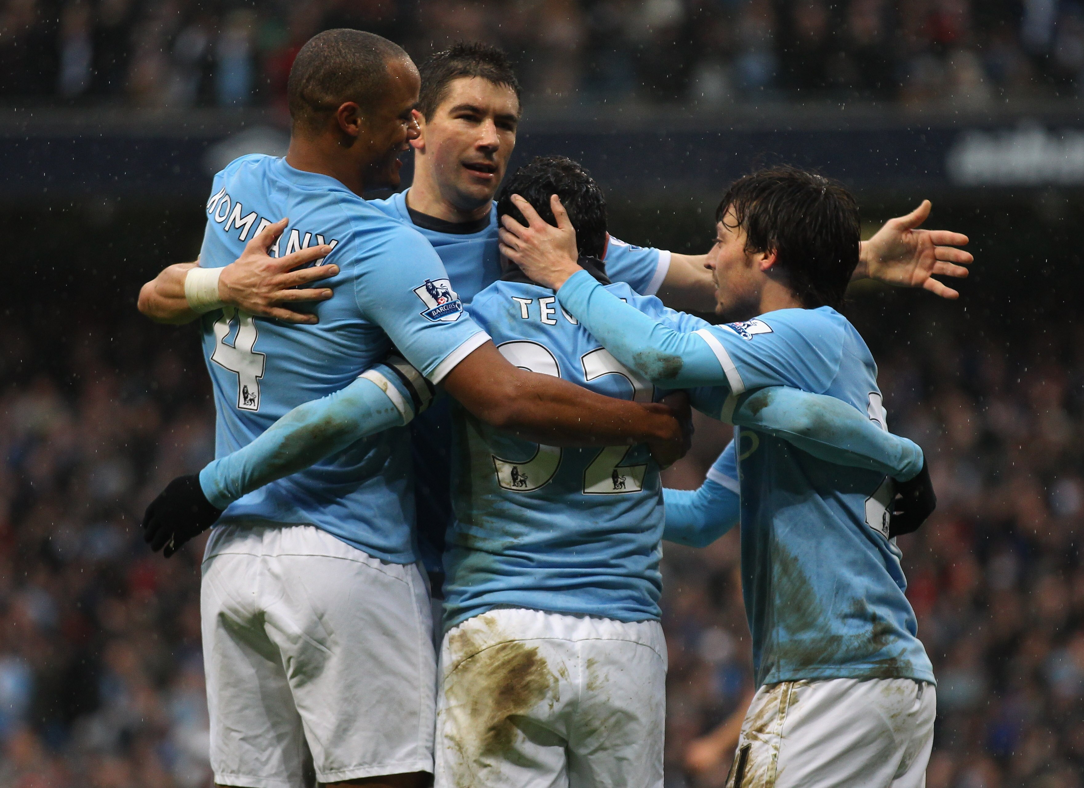 MANCHESTER, ENGLAND - FEBRUARY 05:  Carlos Tevez of Manchester City celebrates with team mates after scoring his second goal during the Barclays Premier League match between Manchester City and West Bromwich Albion at the City of Manchester Stadium on Feb